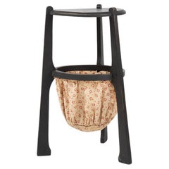 Antique Art Nouveau side table in blackened wood with storage basket, Belgium ca. 1910