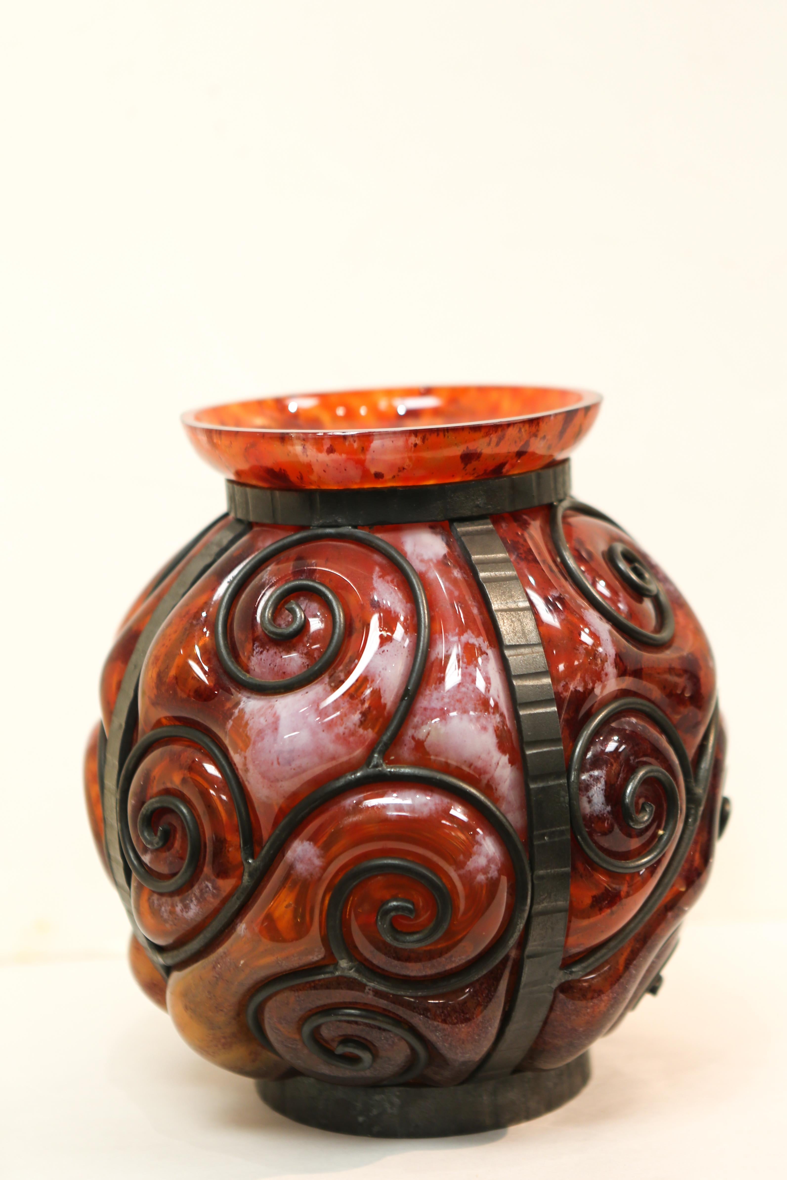 Beautiful Art Nouveau signed art glass vase with blown out glass and wrought iron, signed. Made in France, most likely Daum Nancy. Retailed by Ovington, New York.
