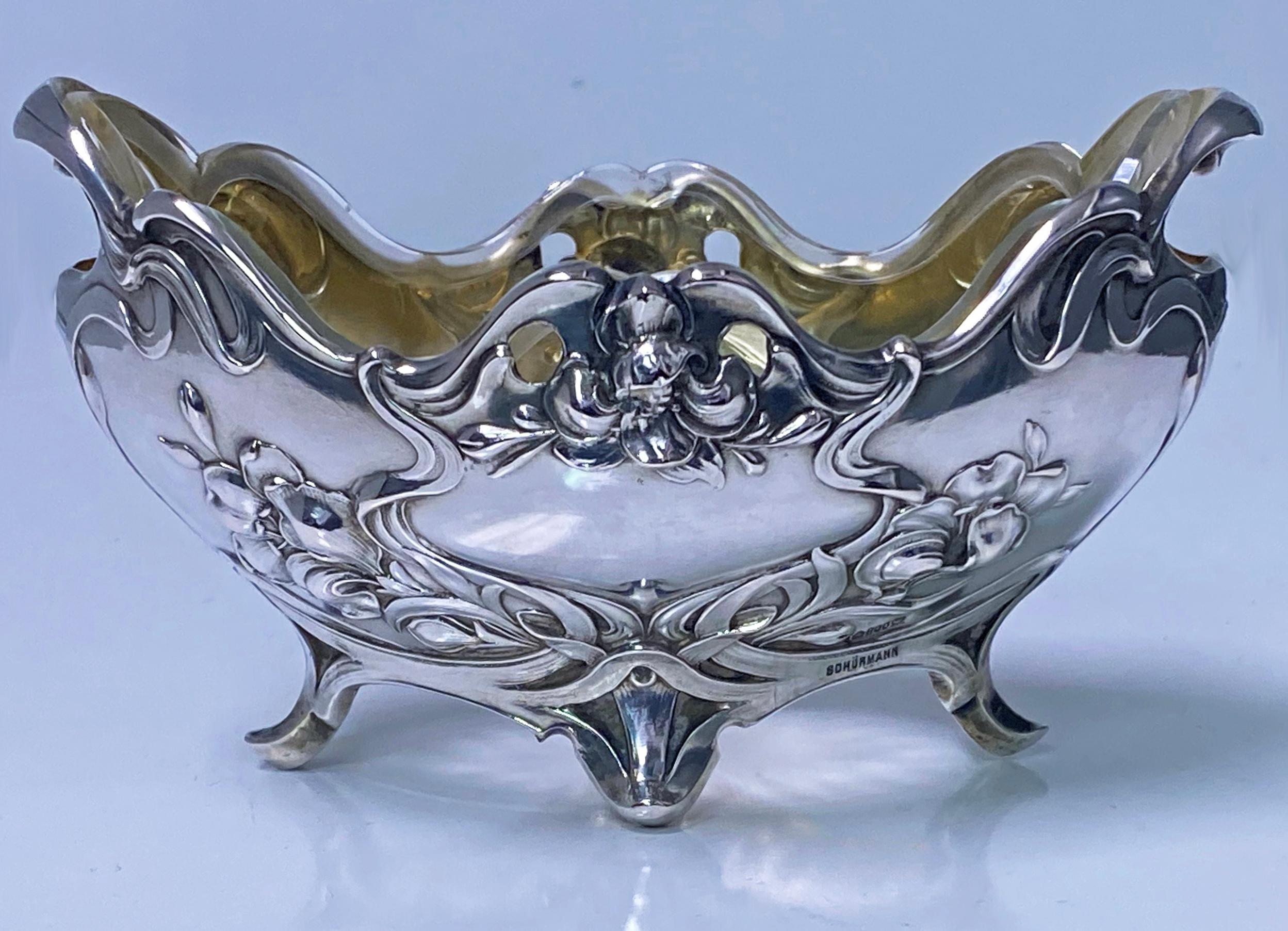 Art Nouveau Silver and glass dish, C.1890 E. Schurmann & Co. Frankfurt, Germany. The oval shaped dish with floral decoration and the original clear glass liner on foliate supports, gilded interior. Full hallmarks for Germany 0.800 std silver and