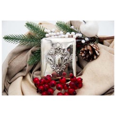 Art Nouveau silver cigarette case with crown motif around monogram