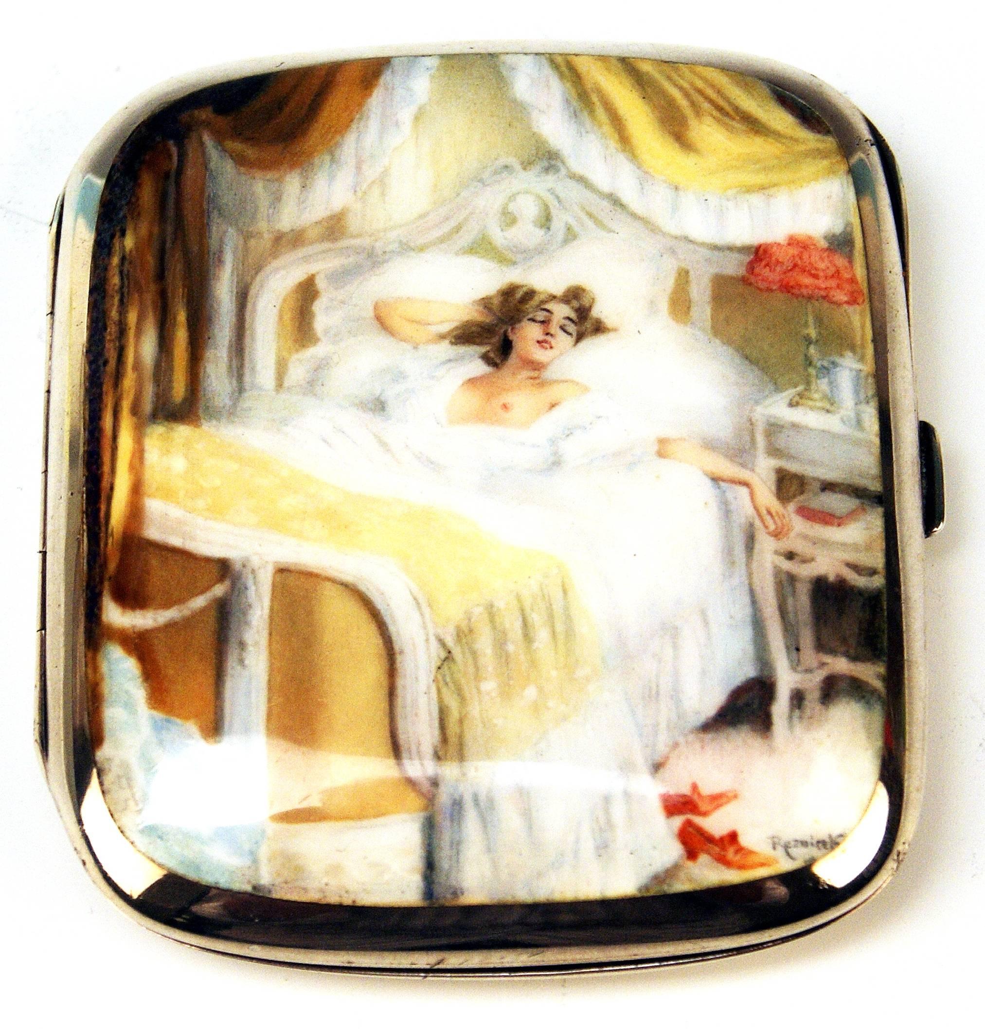 Exquisite cigarette case with Enamel Paing:
Hinged silver box with decorated lid, depiction of a young lady situated in her bed in a luxuriously furnished bedroom, Signature 'Reznicek' in the lower right corner.
Inner gilding.

Ferdinand Freiherr