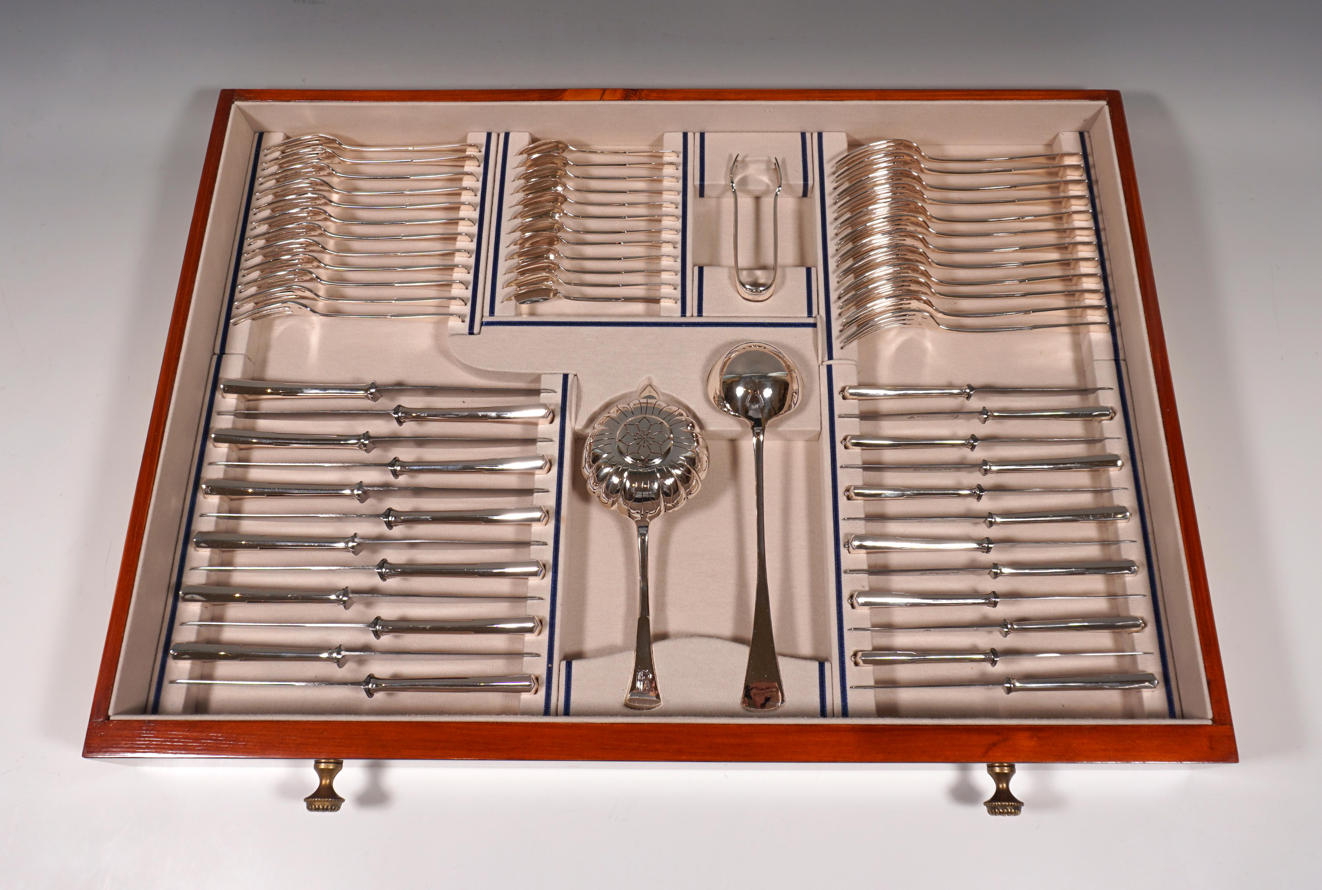 Elegant cutlery set made of solid silver for twelve people, consisting of 122 parts, in wooden showcase.
 
Date of manufactory: circa 1920
Material: Massive silver '800'

Form type: Elegant, simple design with slim bars, expanding like a fan at the