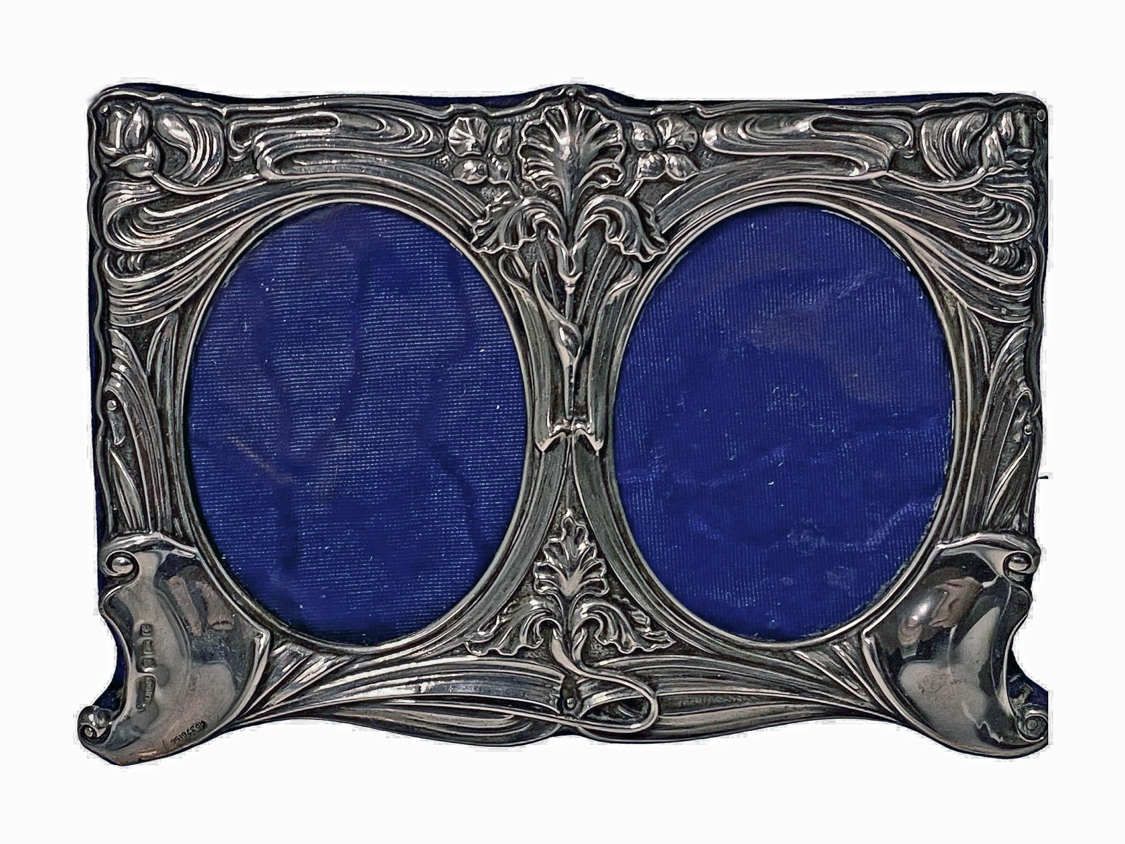 Rare Art Nouveau Silver double Photograph Frame Birmingham 1905 Mappin & Webb. The double frame depicting art nouveau foliate design decoration. Fully hallmarked for Birmingham 1905 Mappin Bros for Mappin and Webb and Reg patent number 376156. Dark