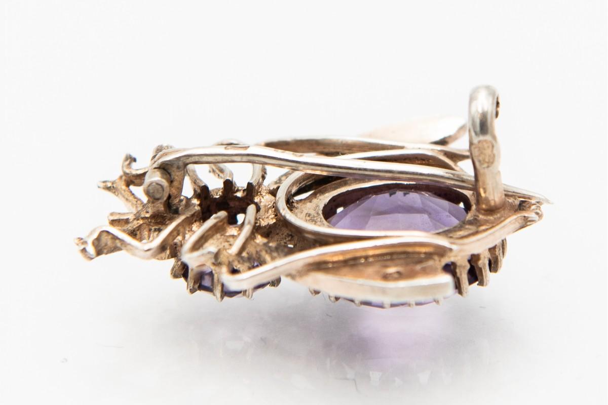 Silver antique brooch inspired by nature, decorated with natural faceted amethysts and natural pearls, made of 0.900 silver.

Origin: Austria-Hungary, Vienna, second half of the 19th century, hallmarks of Sweden

This fly-shaped brooch is a motif of
