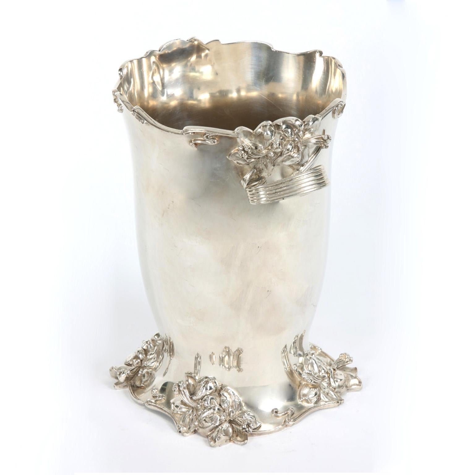 Art Nouveau Meriden silver plated wine cooler/ice bucket with side handles and exterior design details. The cooler is in great antique condition with wear appropriate with age / use. Maker's mark undersigned. The cooler measure about 10 inches high