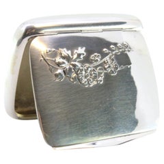 Art Nouveau silver snuffbox with floral reliefs & paper holder