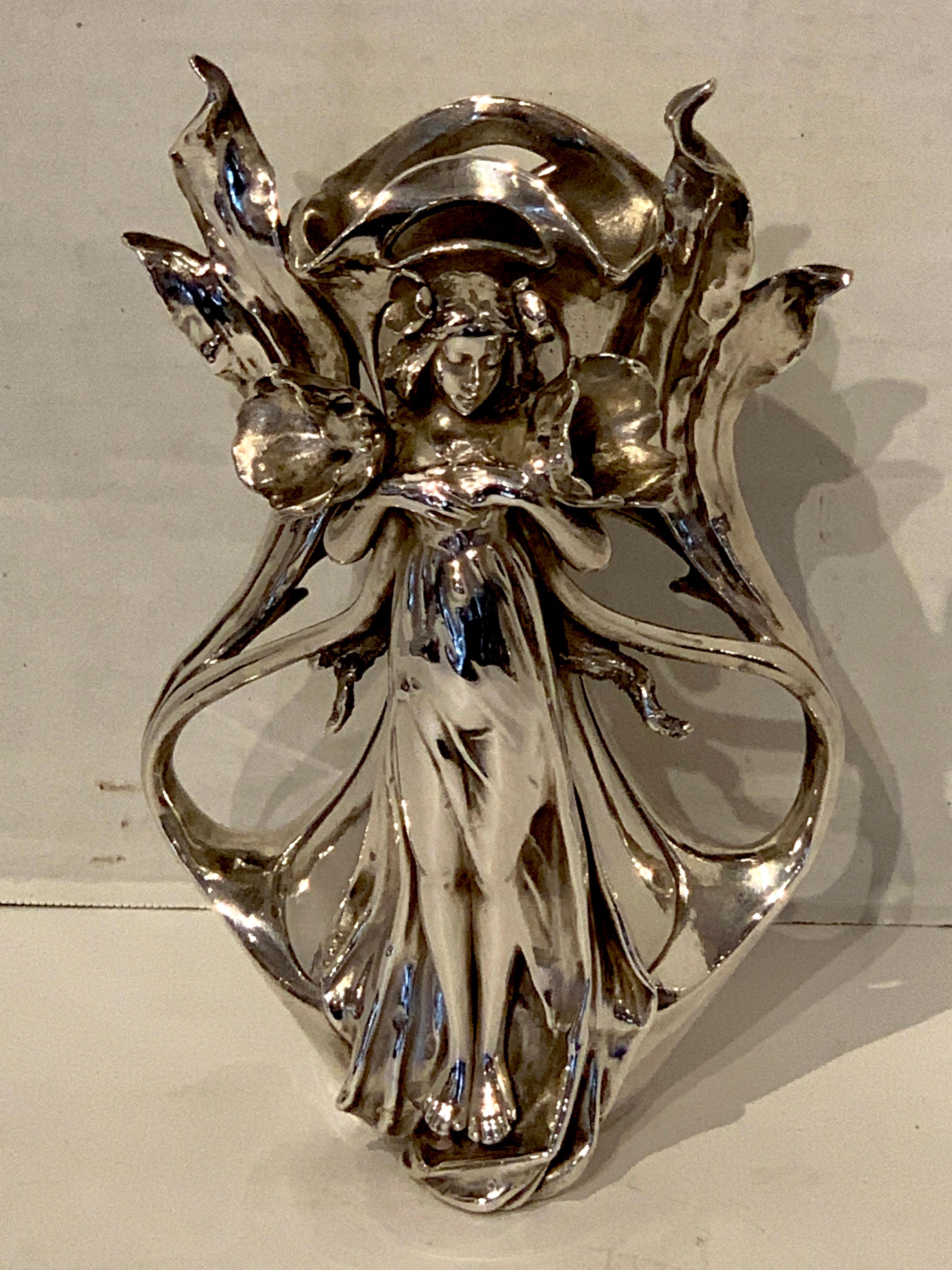 Art Nouveau silver overlay figural vase with standing draped female figure flanked by two flowers, with pierced vase. Sterling over porcelain, numbered # 3222, with cypher mark.