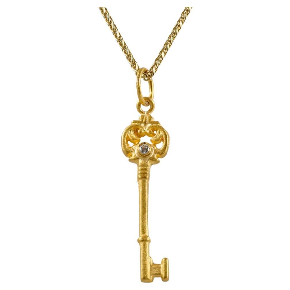 Art Nouveau, Skeleton Key with Diamond Charm Pendant, 24K Gold & 0.02ct Diamonds For Sale