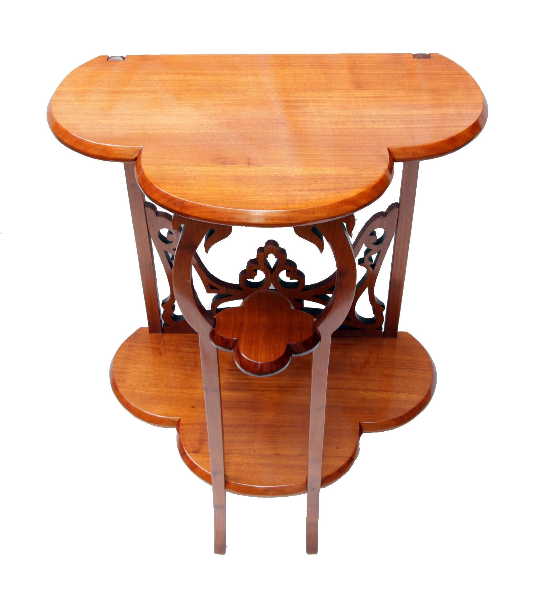 Very nice small Art Nouveau console table in solid mahogany with great Art Nouveau ornaments.Beautiful Art Nouveau ornament carving in the back. In very good restored condition.