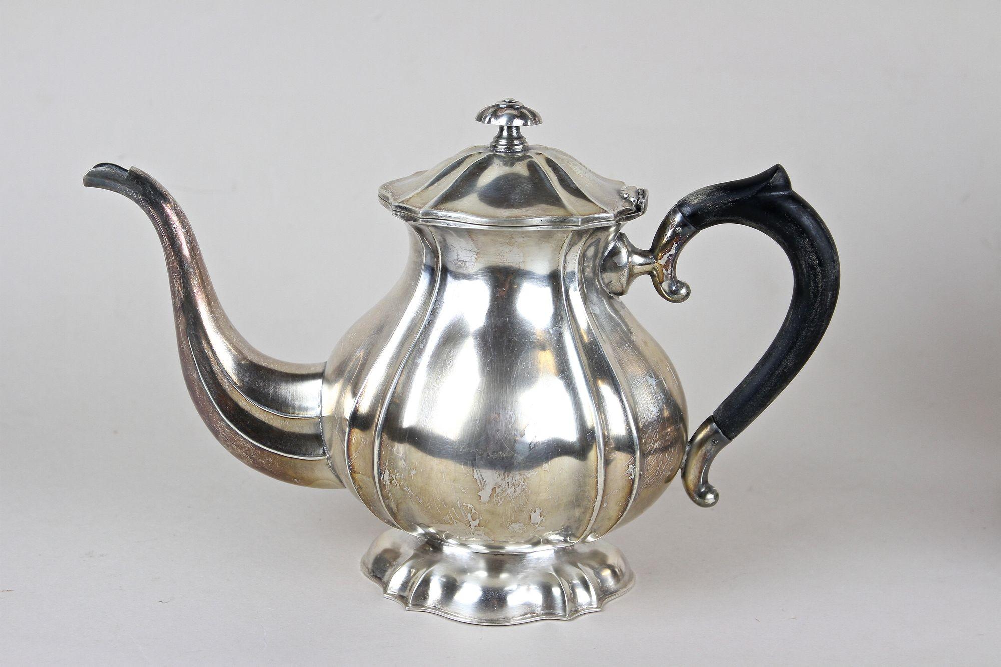 Absolutely gorgeous solid silver Art Nouveau coffee/ tea set of four from the period around 1900 in Austria. This fantastic tea set consists of four matching pieces: a small milk jug, a sugar bowl, a teapot and a coffee pot. All pieces show an