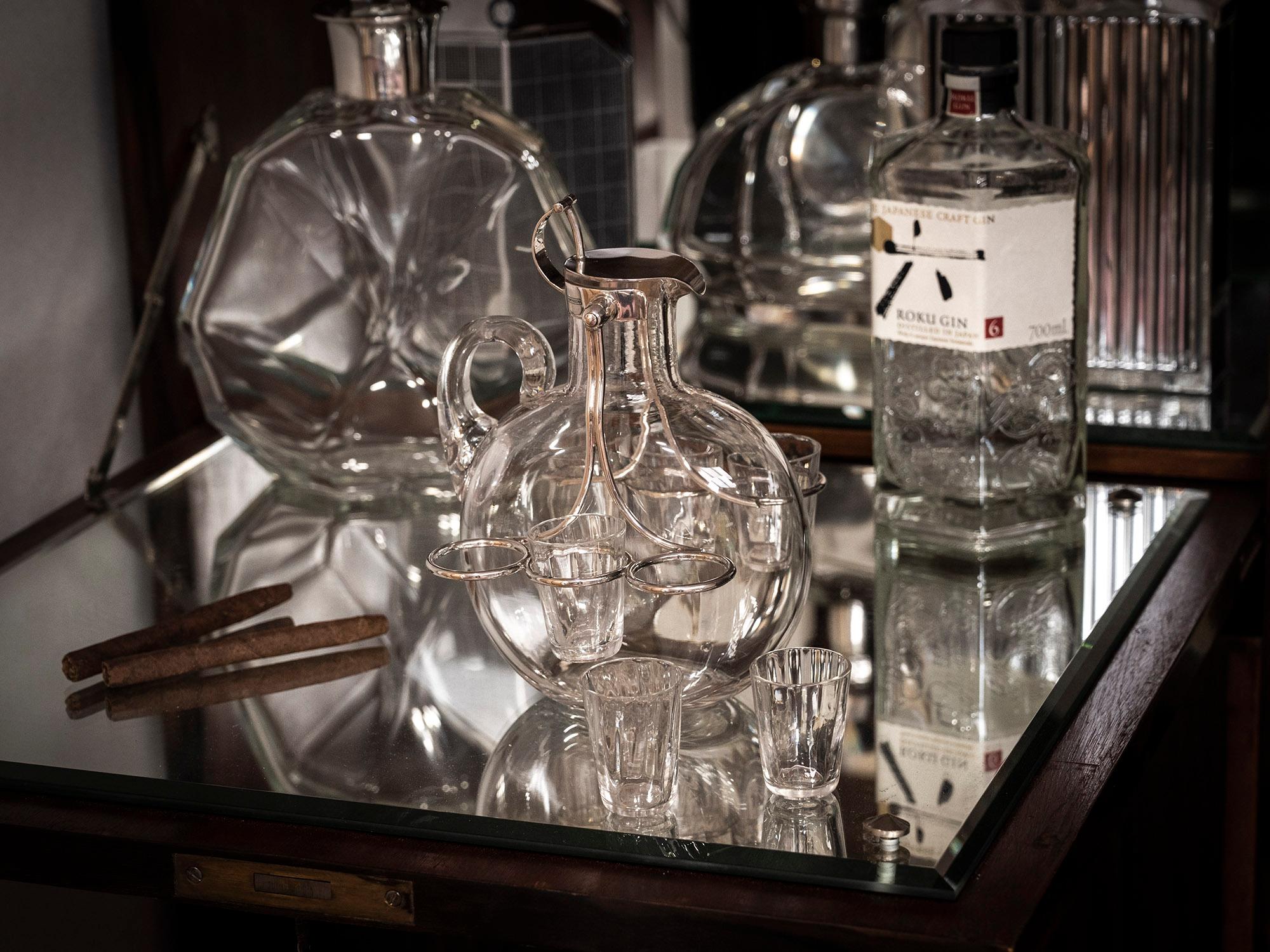Sterling Silver

From our Decanter collection, we are pleased to offer this Rare Art Nouveau Spirit Decanter set by renowned firm Hukin & Heath. The set comprising of a single rounded decanter bottle with a sterling silver mount which branches on