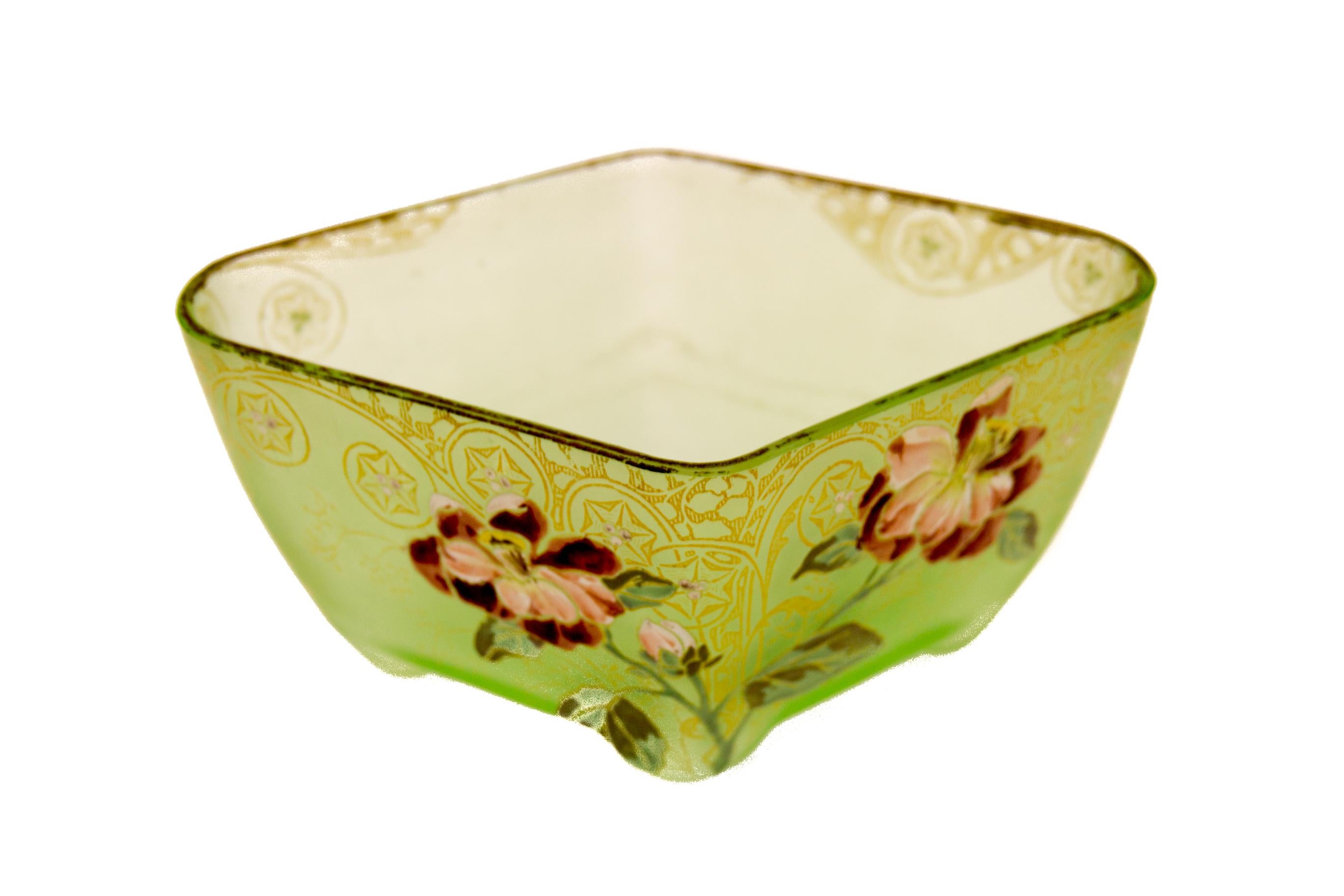 French Art Nouveau frosted green glass bowl or jardinière with an enameled hand painted floral decoration and gold highlight pattern, circa 1920.
In a good condition, slight loss to gold pattern on top.
Dimensions: height 11 cm / 4.3 in; width 18