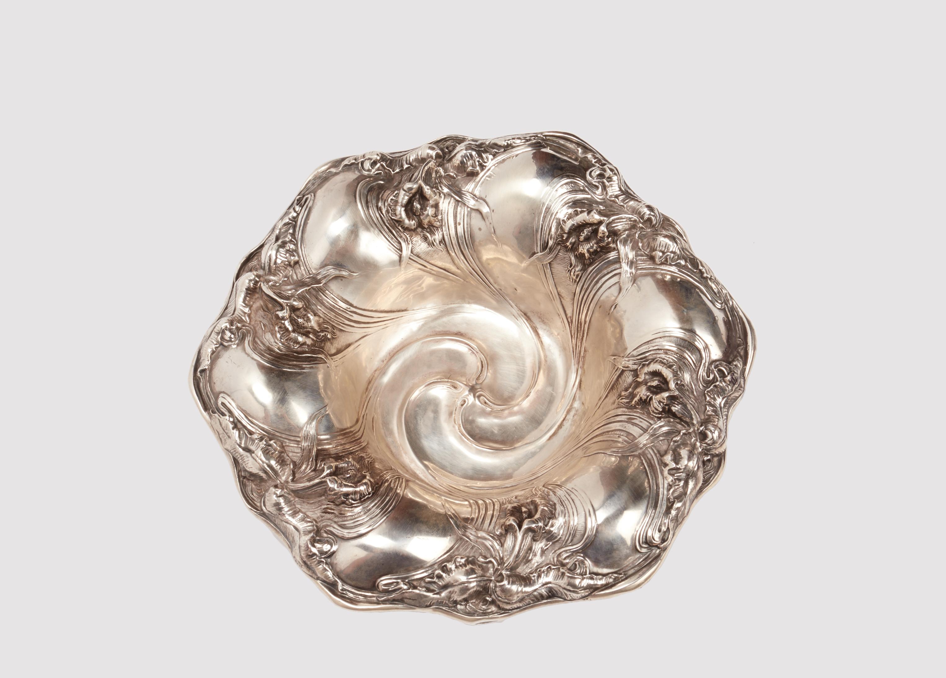 Art Nouveau sterling silver bowl, round shape. The repoussé decoration is in purest Art Nouveau style, depicting orchids. Unger Broters, Newark, New Jersey. United States circa 1890. 