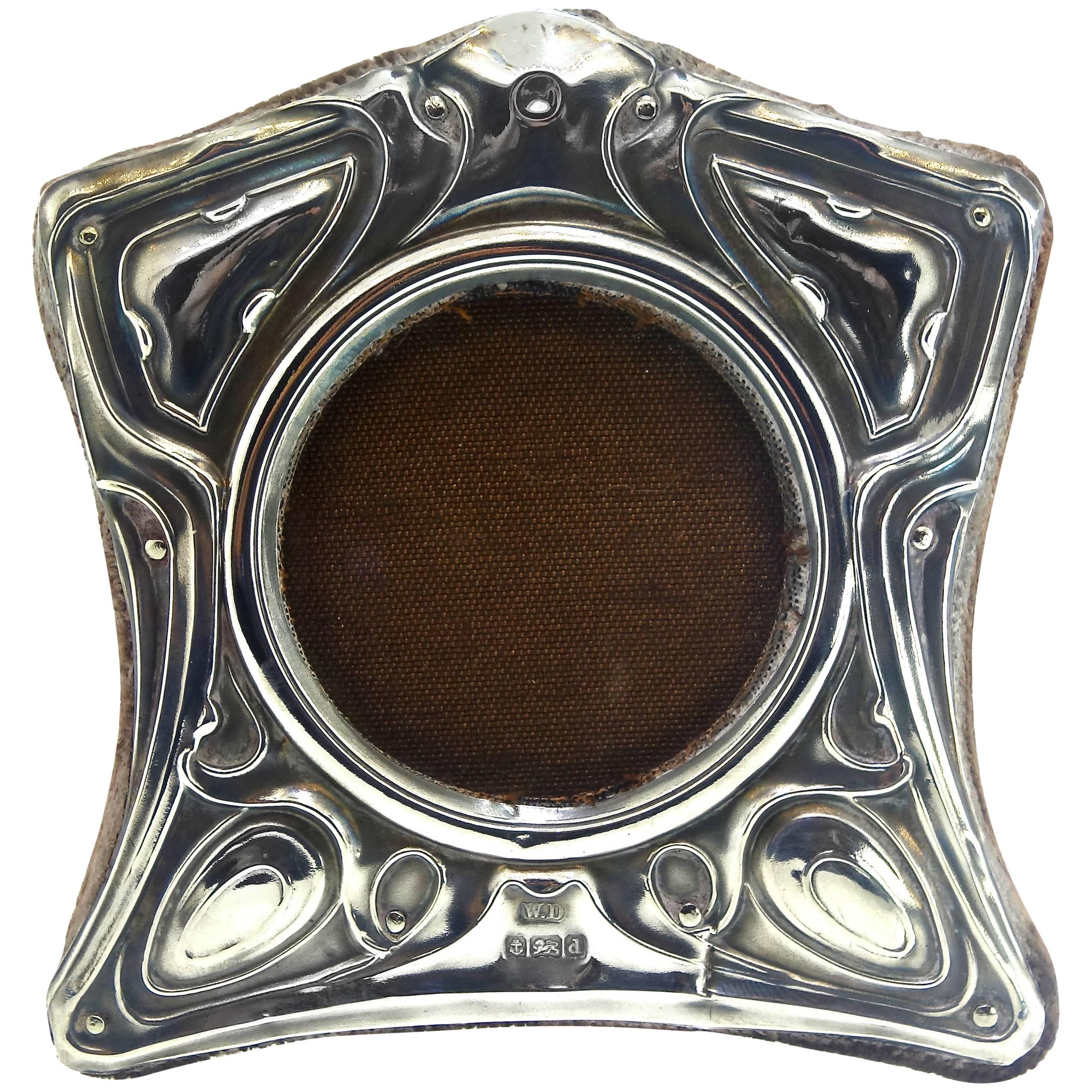 Antique silver frame, with the initials W.D, an anchor, lion and a small d, (see our magnified photos), this period frame is backed with the original velvet cloth.  As with many objects made about 120 years ago, there is a very slight discoloration