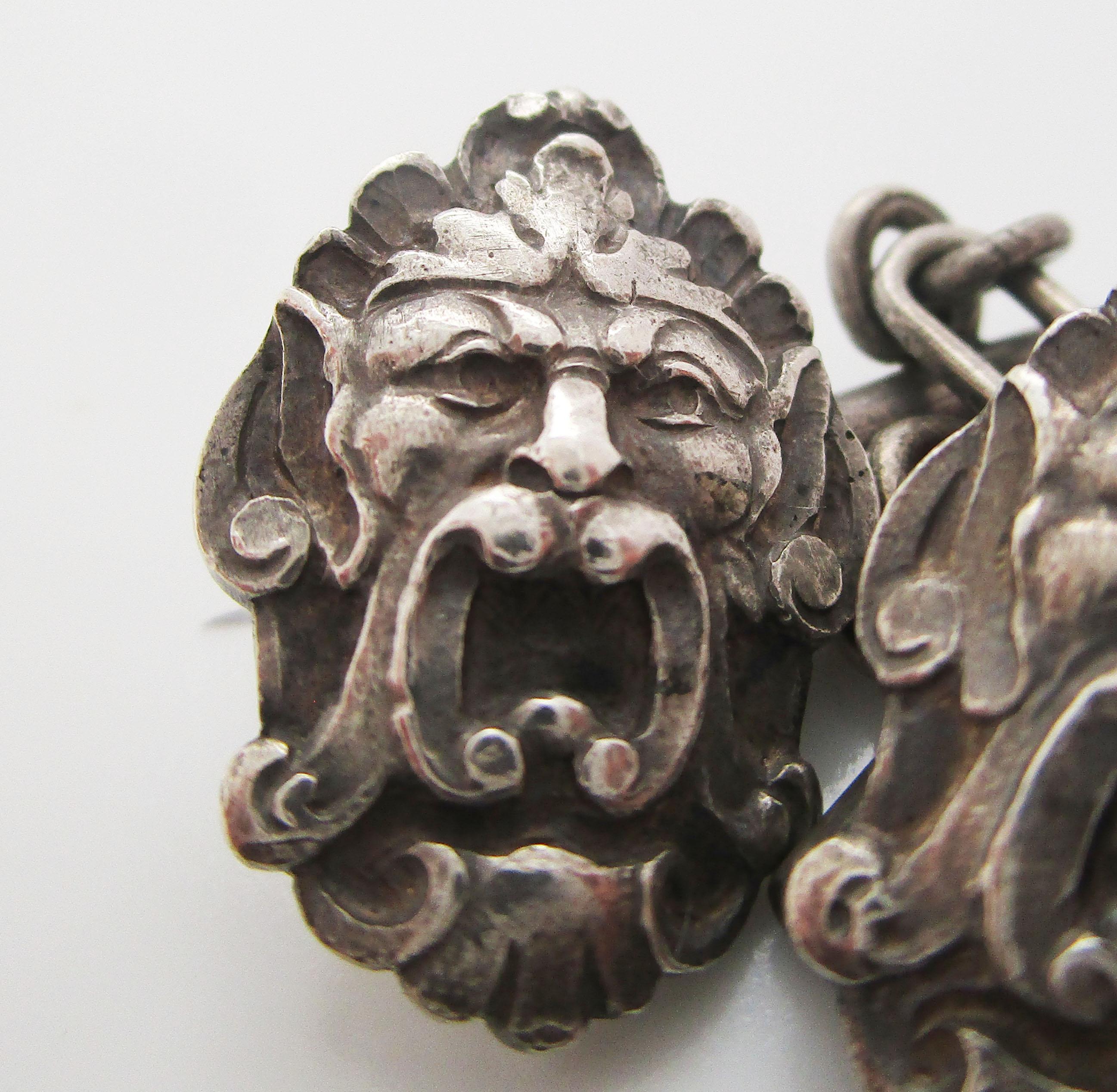 This fantastic pair of Art Nouveau cufflinks is in sterling silver and has a skillfully crafted grotesque mask design. The face depicted on these links could be that of a dramatic Greek mask, or perhaps that of an ancient Norse wind god. No matter