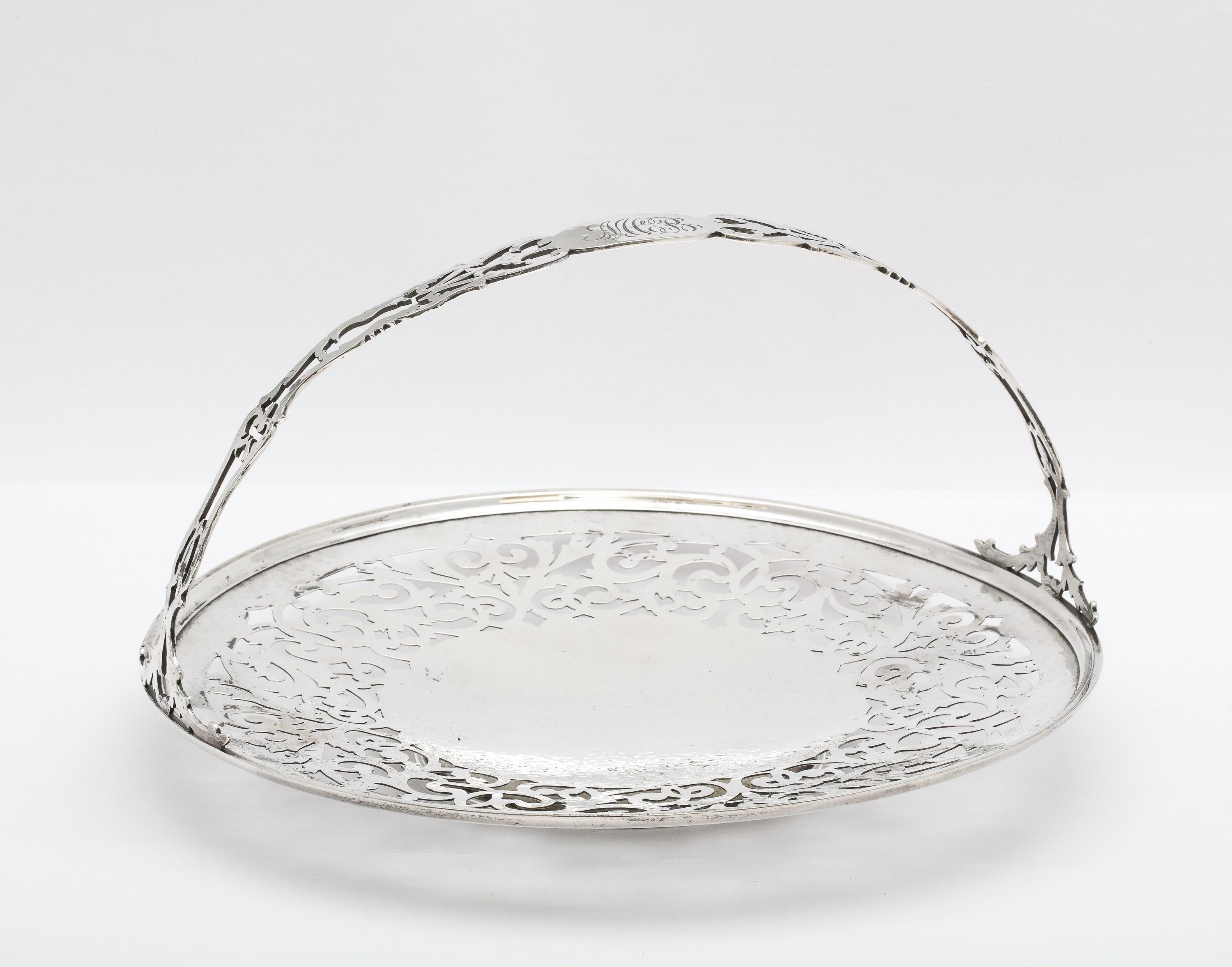 Art Nouveau, sterling silver, pedestal based, cake/cookie platter/basket,  Gorham Manufacturing Company, Providence, Rhode Island, year-hallmarked for 1918. Lightly hammered in design and having a lovely, pierced design that is continued on the