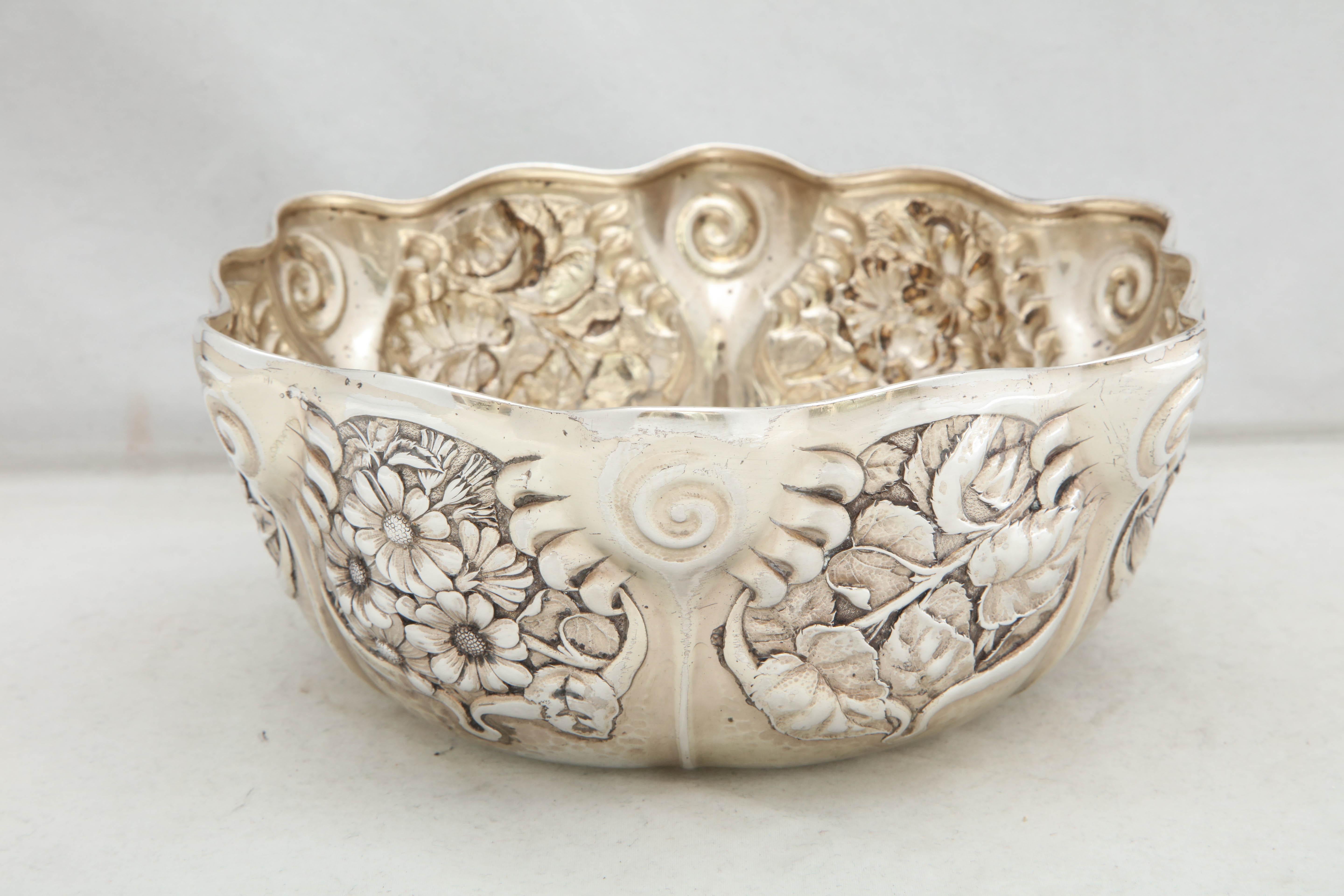 Art Nouveau, sterling silver serving bowl, Whiting Manufacturing Co., New York, circa 1900. Chased with lovely flowers. Measures 3 1/2 inches high x 8 1/2 inches diameter. Weighs 12.910 Troy ounces. Dark spots in photos are reflections. Excellent