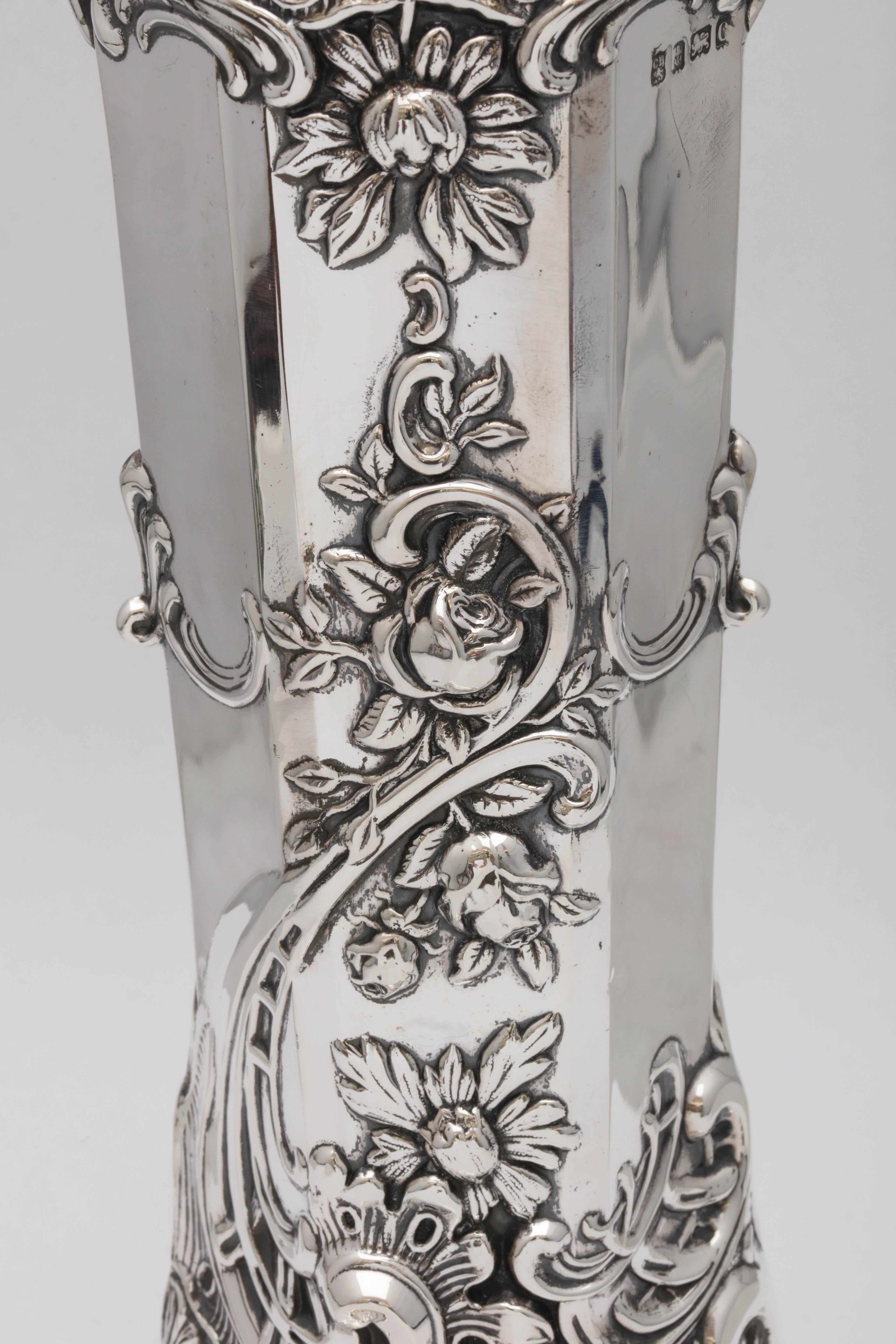 Sterling silver, Art Nouveau vase, Birmingham, England, 1902, Cooper Bros. and Sons - makers. Hexagonal in design, with beautiful floral decoration. Opening is scalloped in a hexagonal fashion. Stands 9 inches high x over 4 1/2 inches diameter
