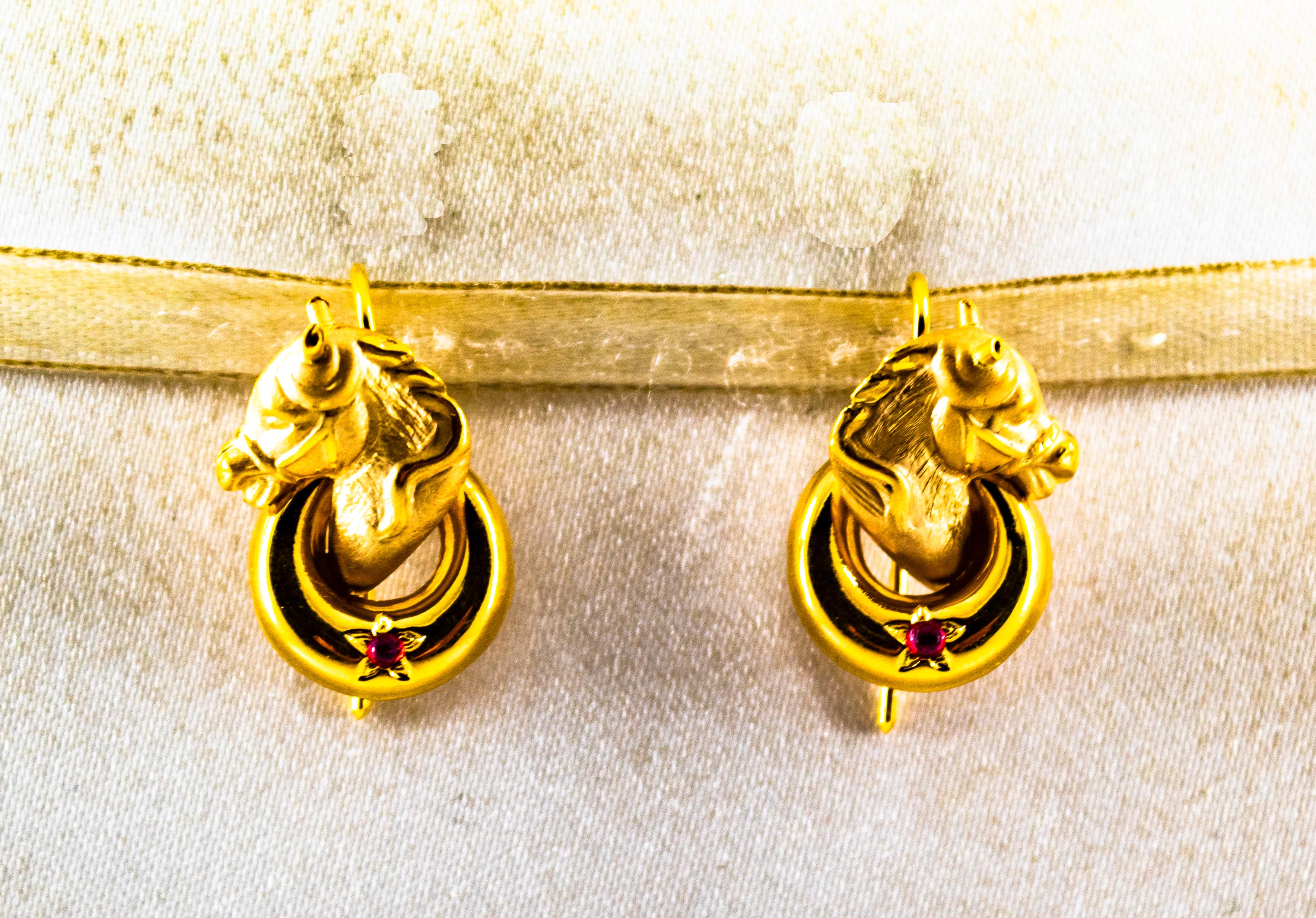 These Earrings are made of 14K Yellow Gold.
These Earrings have 0.10 Carats of Rubies.

All our Earrings have pins for pierced ears but we can change the closure and make any of our Earrings suitable even for non-pierced ears.
We're a workshop so