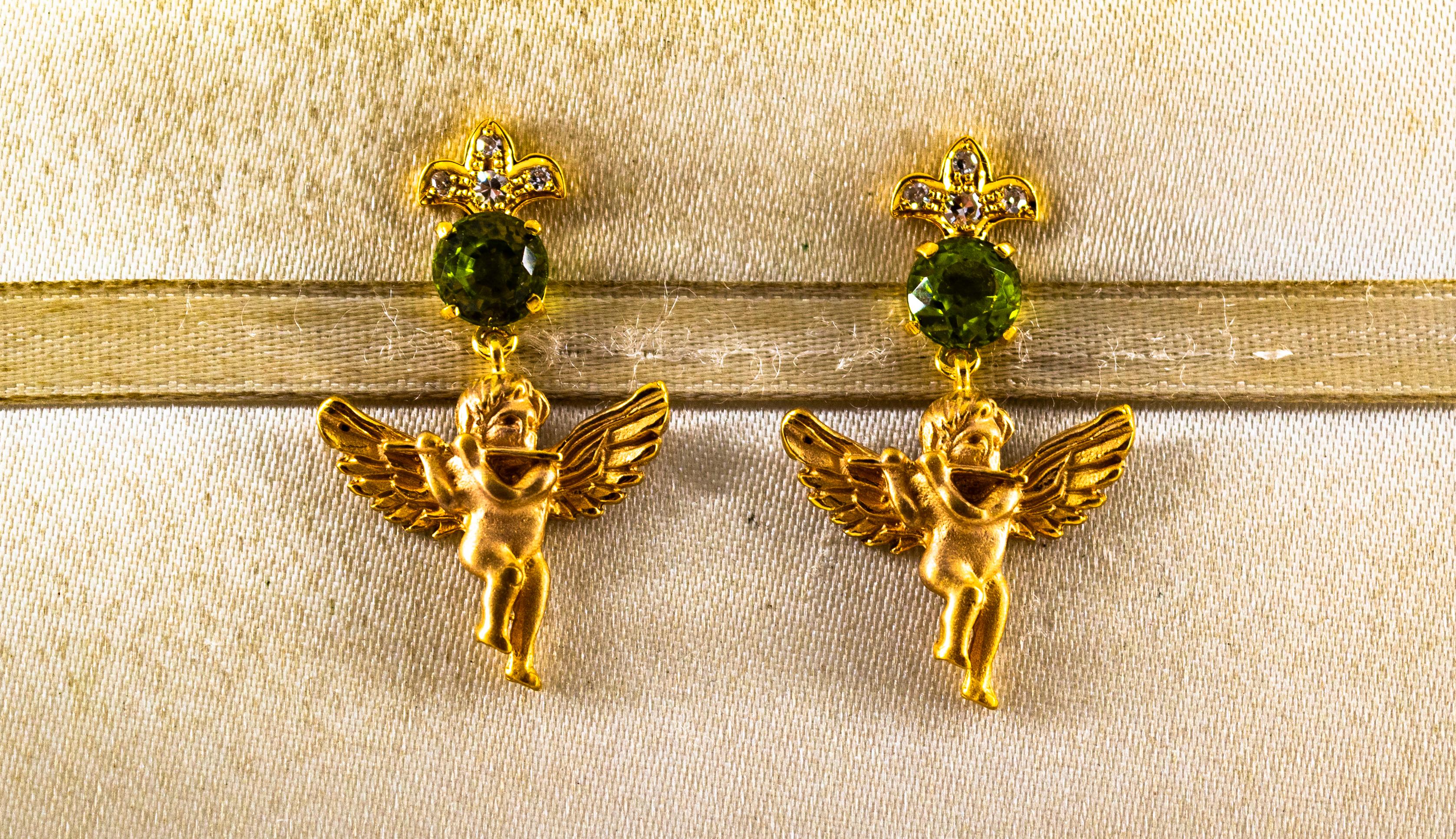 These Earrings are made of 9K Yellow Gold.
These Earrings have 0.20 Carats of White Brilliant Cut Diamonds.
These Earrings have 2.60 Carats of Peridots.

These Earrings are inspired by Art Nouveau.

All our Earrings have pins for pierced ears but we