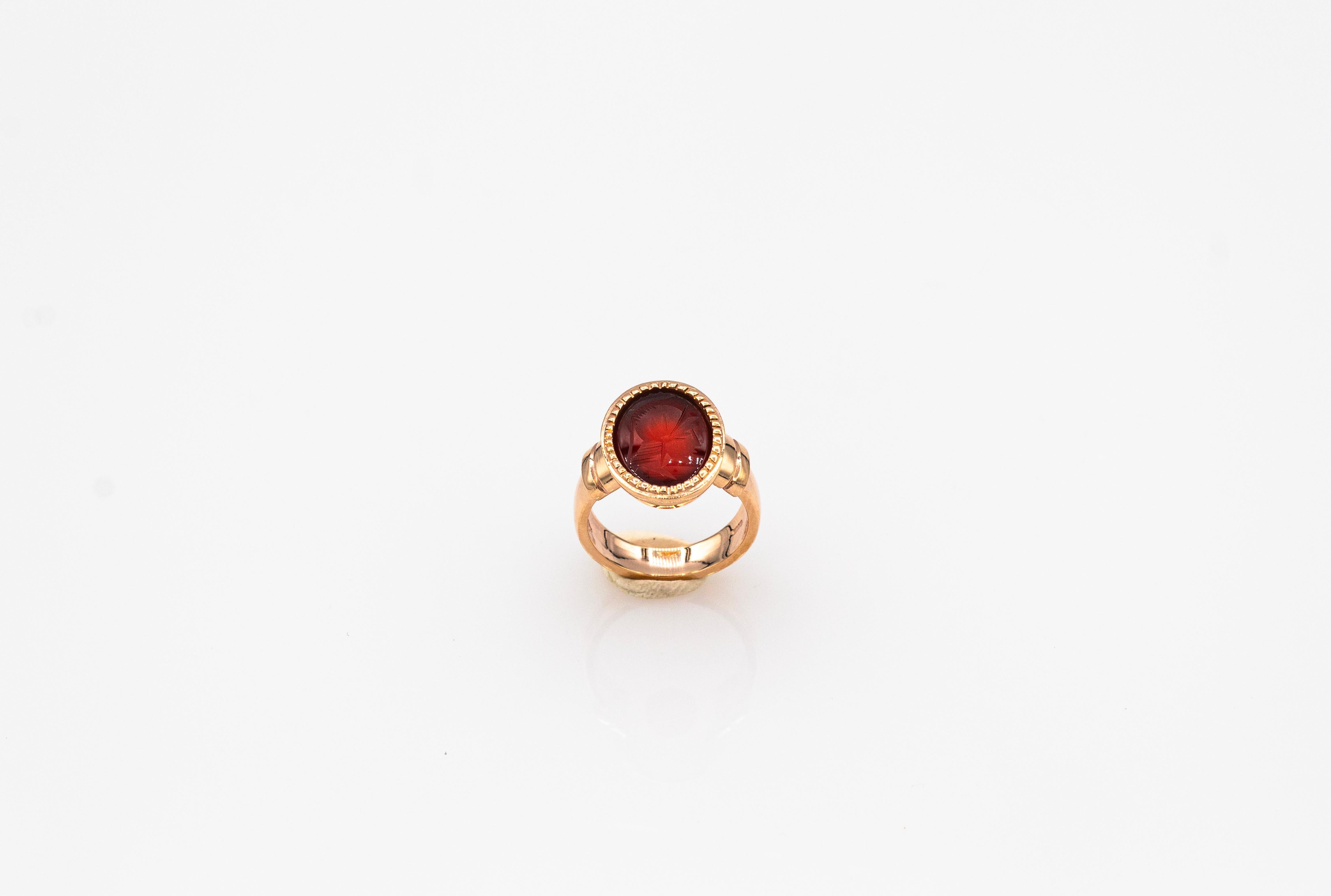 Art Deco Art Nouveau Style 4.20 Carats Carved Red Carnelian Yellow Gold Cocktail Ring For Sale