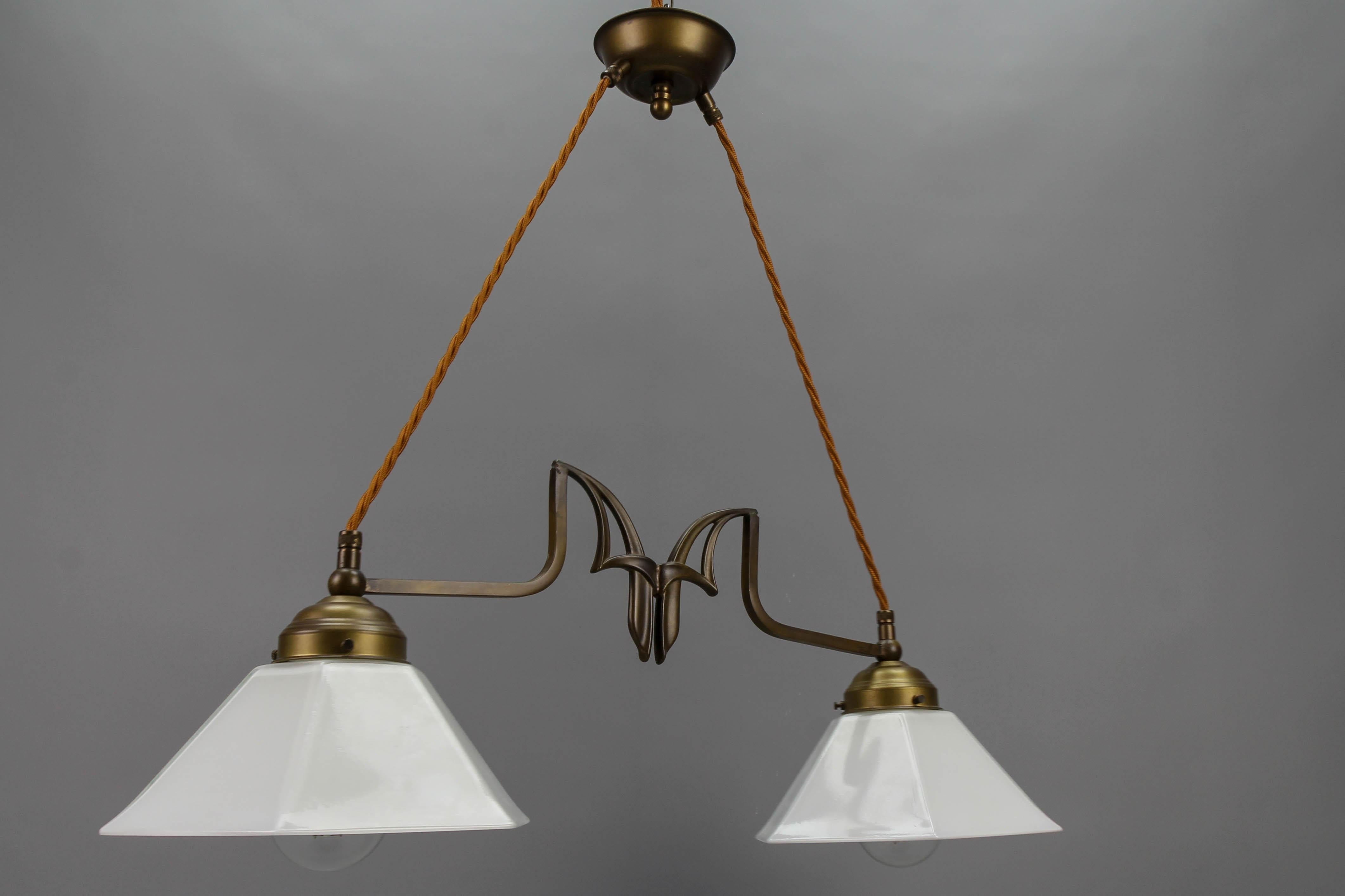 Mid-20th Century Art Nouveau Style Brass and White Glass Two-Light Pendant Chandelier For Sale