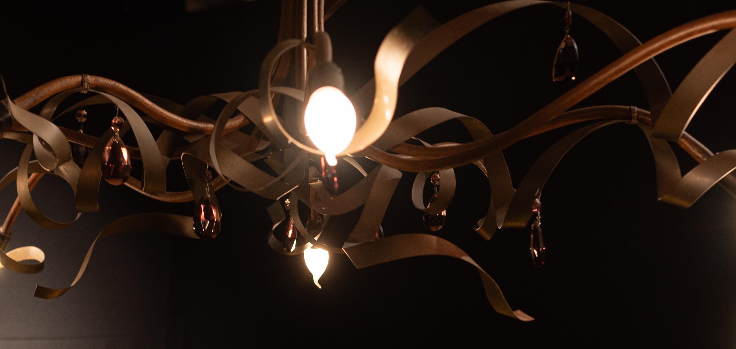 Ruban Plié lamp by Jacco Maris
Art nouveau style 
Stainless steel, prune coloured glass drops