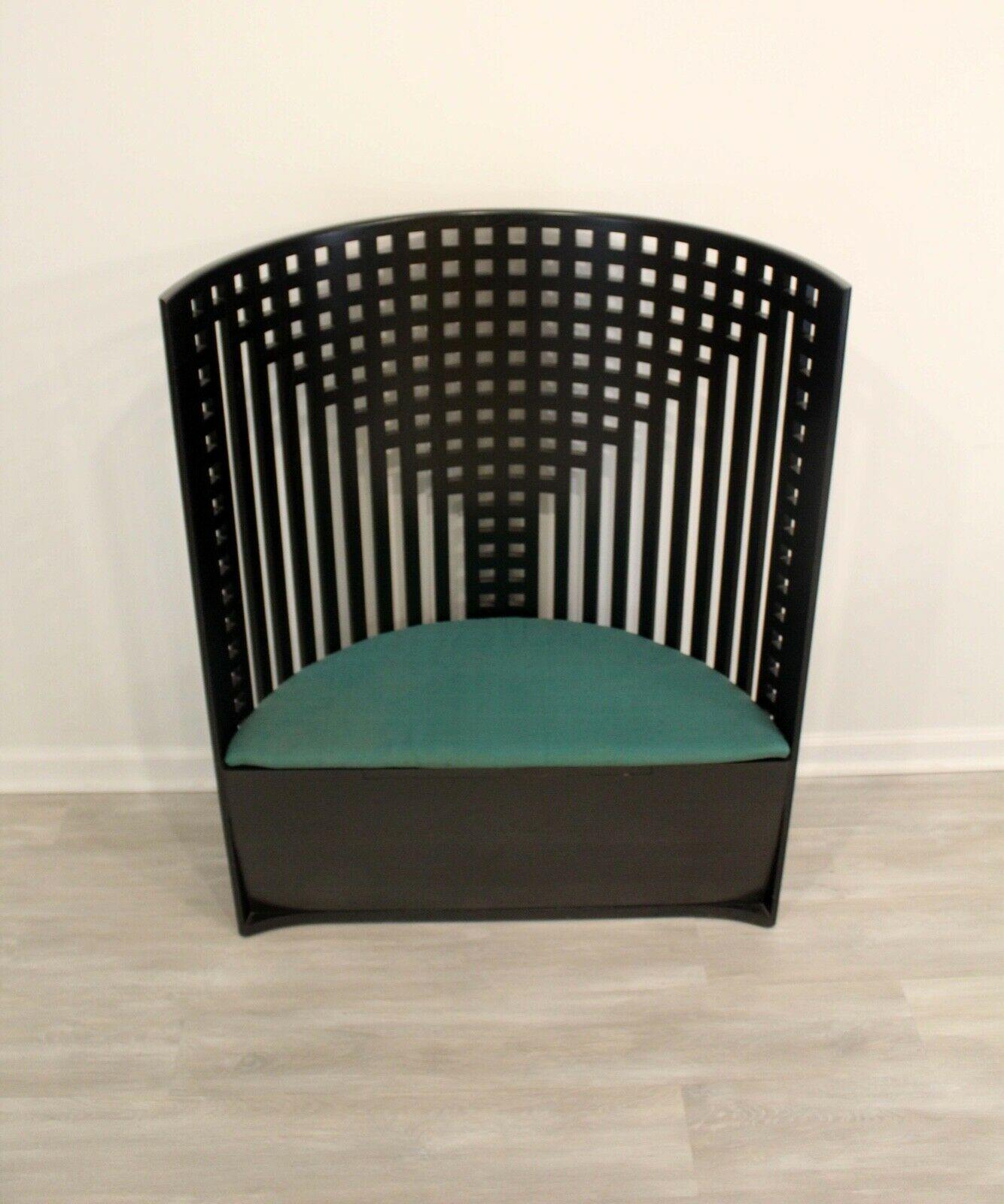 Trone-armchair designed by Charles Rennie Mackintosh in 1904. Relaunched in 1973. Manufactured by Cassina in Italy. This throne-like armchair is a new iteration of the model that CRM donated, in 1904, to the “Willow Tea Rooms” in Glasgow, his native