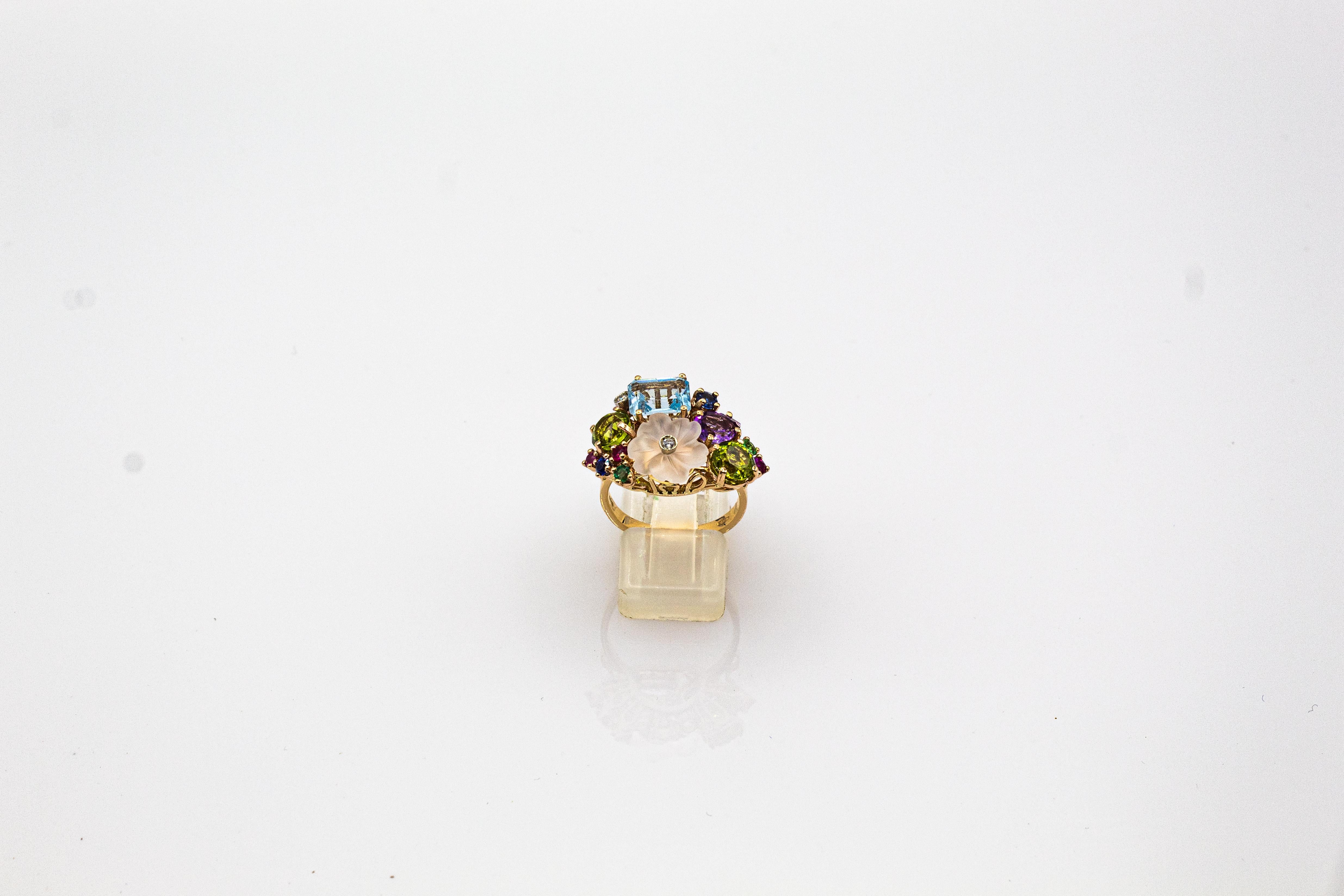 This Ring is made of 14K Yellow Gold.
This Ring has 0.04 Carats of White Brilliant Round Cut Diamonds.
This Ring has 0.20 Carats of Rubies.
This Ring has 0.08 Carats of Emeralds.
This Ring has 0.12 Carats of Blue Sapphires.
This Ring has also Rock