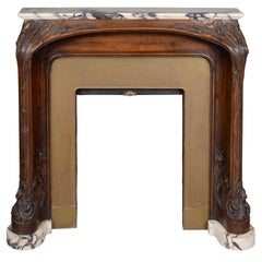Art Nouveau style fireplace in walnut wood and Panazeau marble