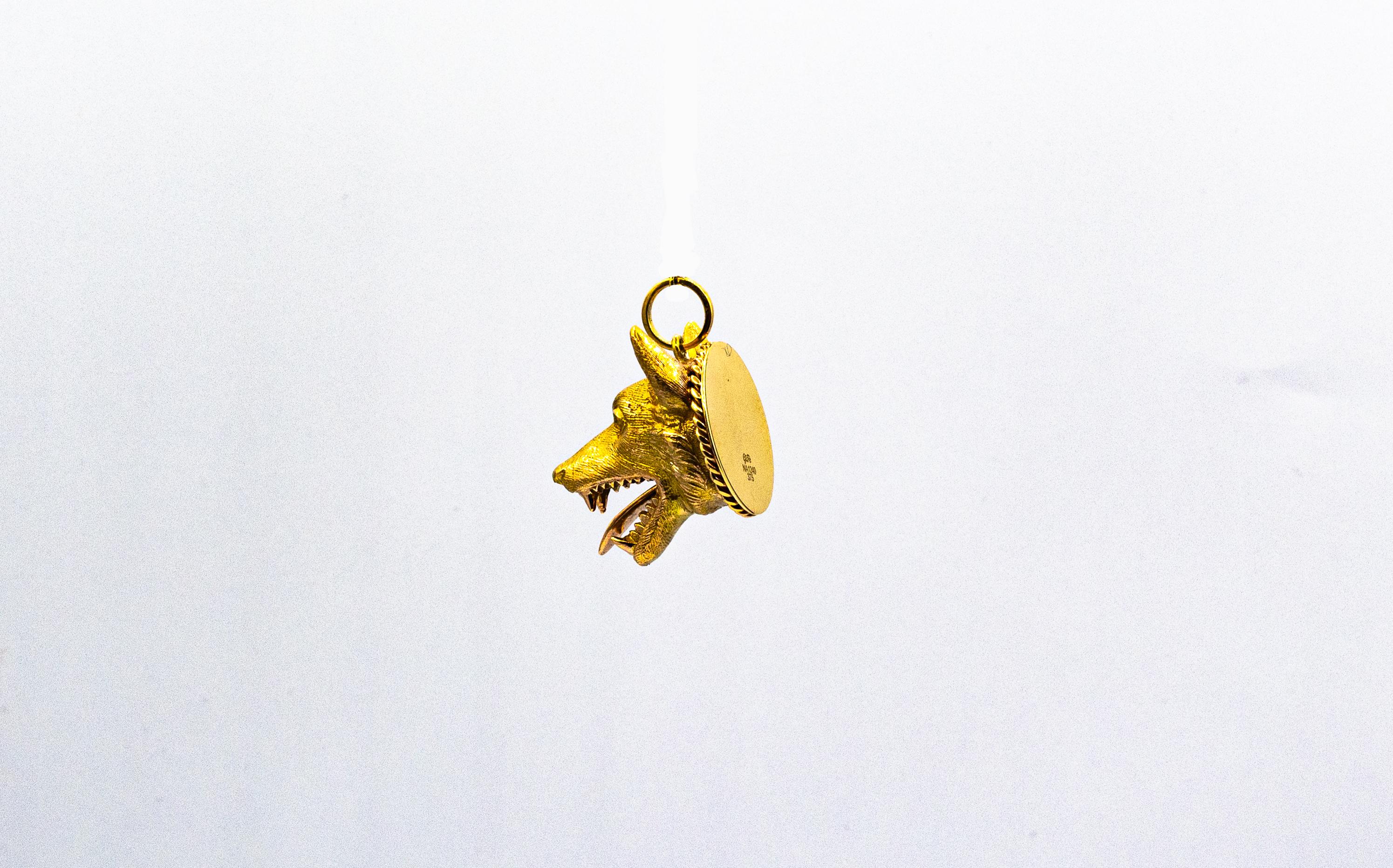 gold wolf pendant