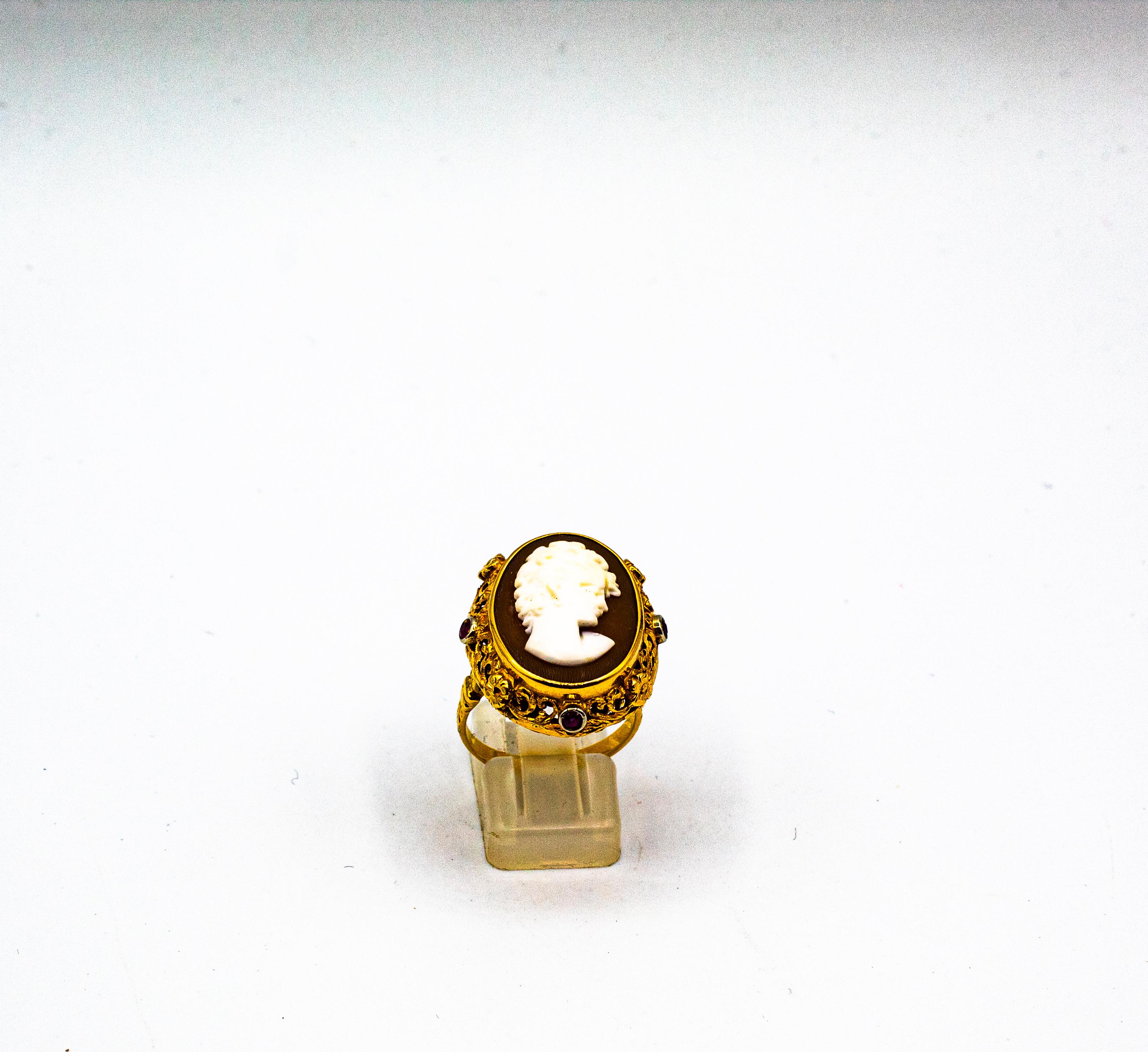 This Ring is made of 18K Yellow Gold.
This Ring has an Handcrafted Shell Cameo.
This Ring has 0.25 Carats of Rubies.

Size ITA: 18 USA: 8 1/4

We're a workshop so every piece is handmade, customizable and resizable.
