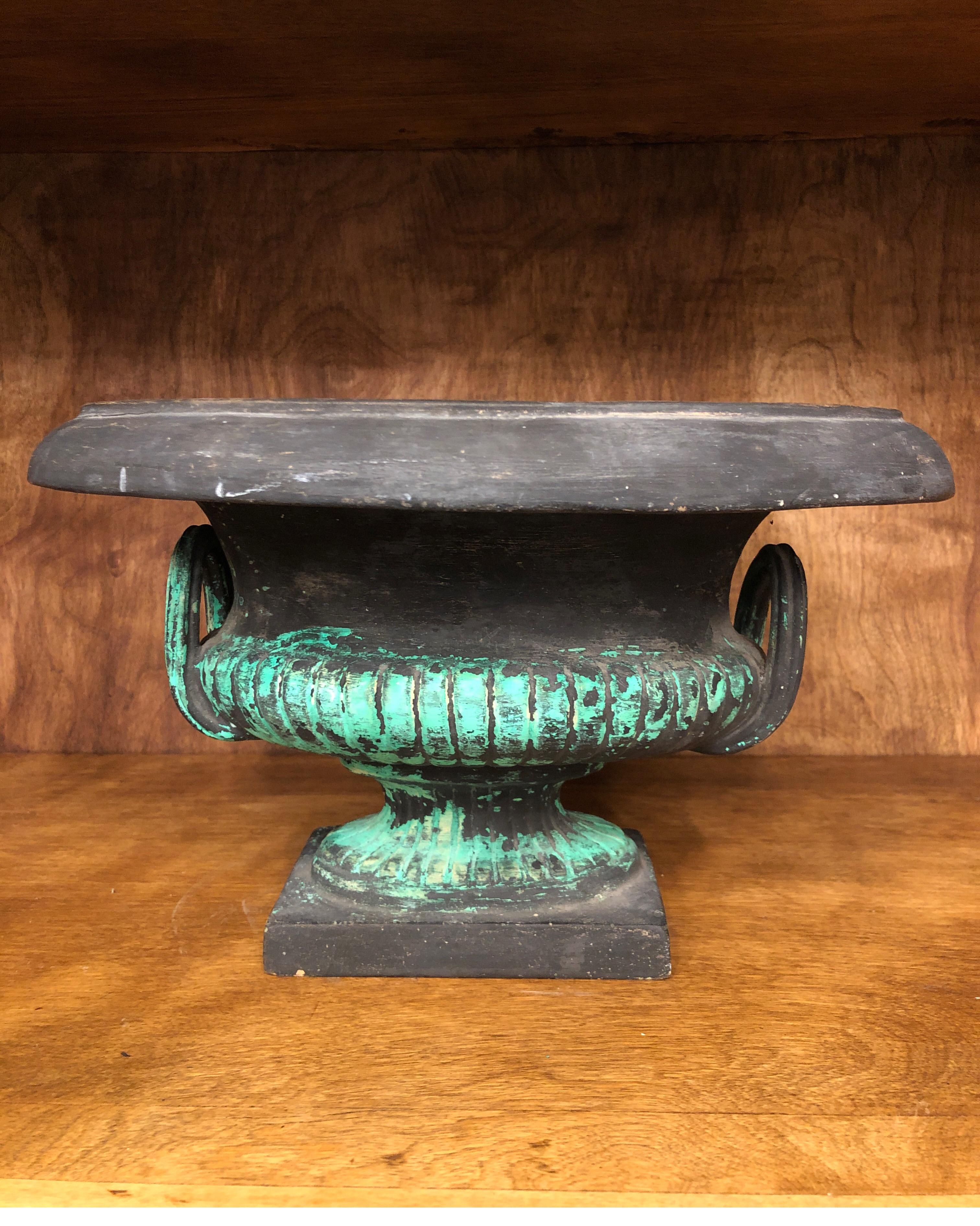 Black ceramic Art Nouveau style jardinière with green distressed finish.
Inside is flamed glaze and outside is natural finish.
Minor chipping/scuffs. (See pics).

Signed Italy.