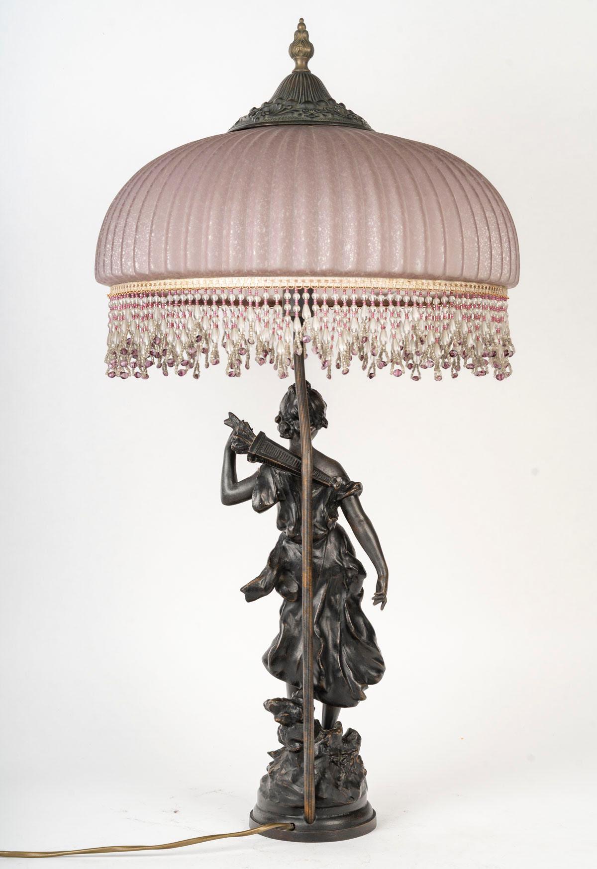 20th Century Art Nouveau Style Lamp, Bronze Sculpture, and Glass Shade. For Sale