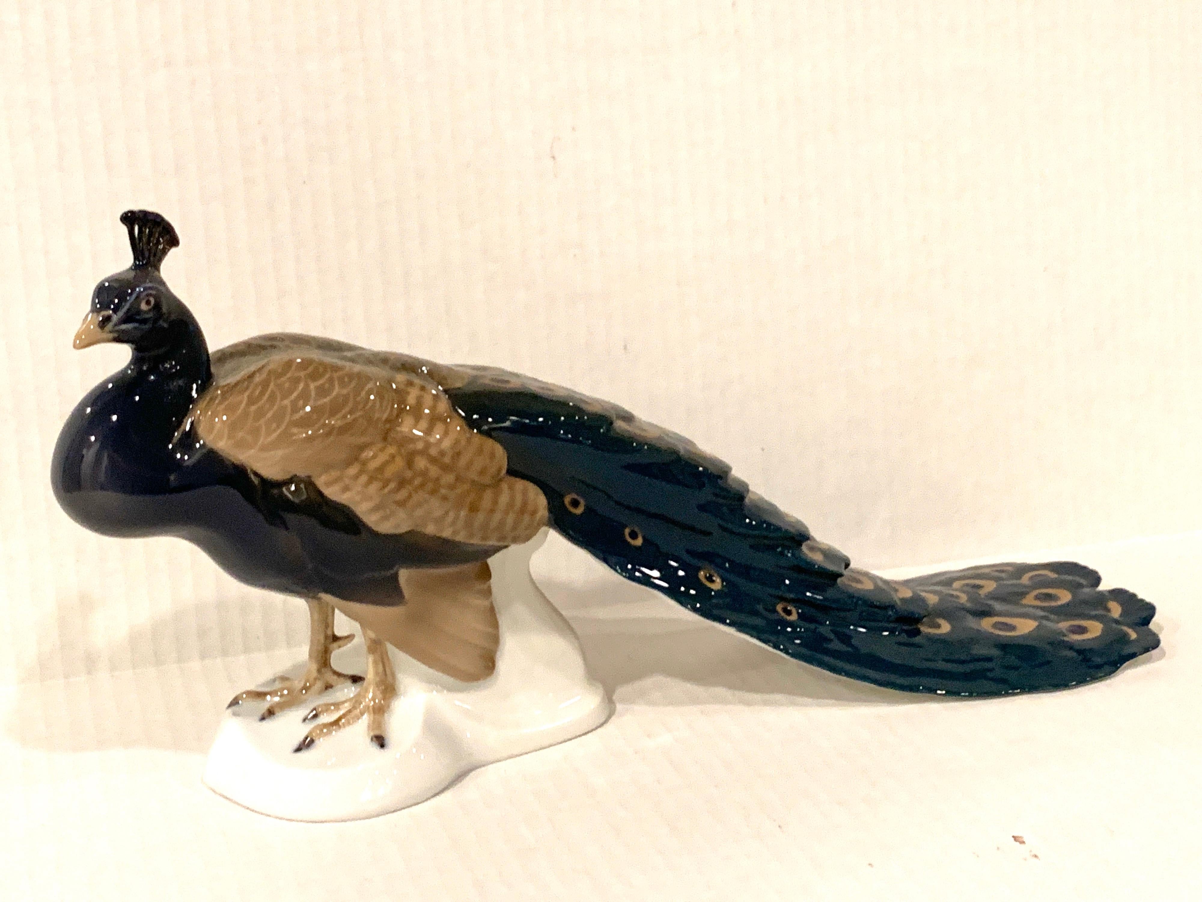 Art Nouveau style Dahl Jensen for B&G model of a Peacock, Bing & Grondahl porcelain Peacock, designed by Dahl Jensen.