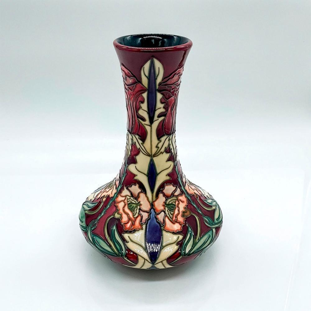 Refined Art Pottery Vase, very decorative . Decorated with flower such as roses and peach carnations. 
Design by Rachel Bishop 2000 .  Size : 5.75 inches w x 8 inches high . 
Moorcroft impressed marks; '2000' and a leaf year marks; artists' initials