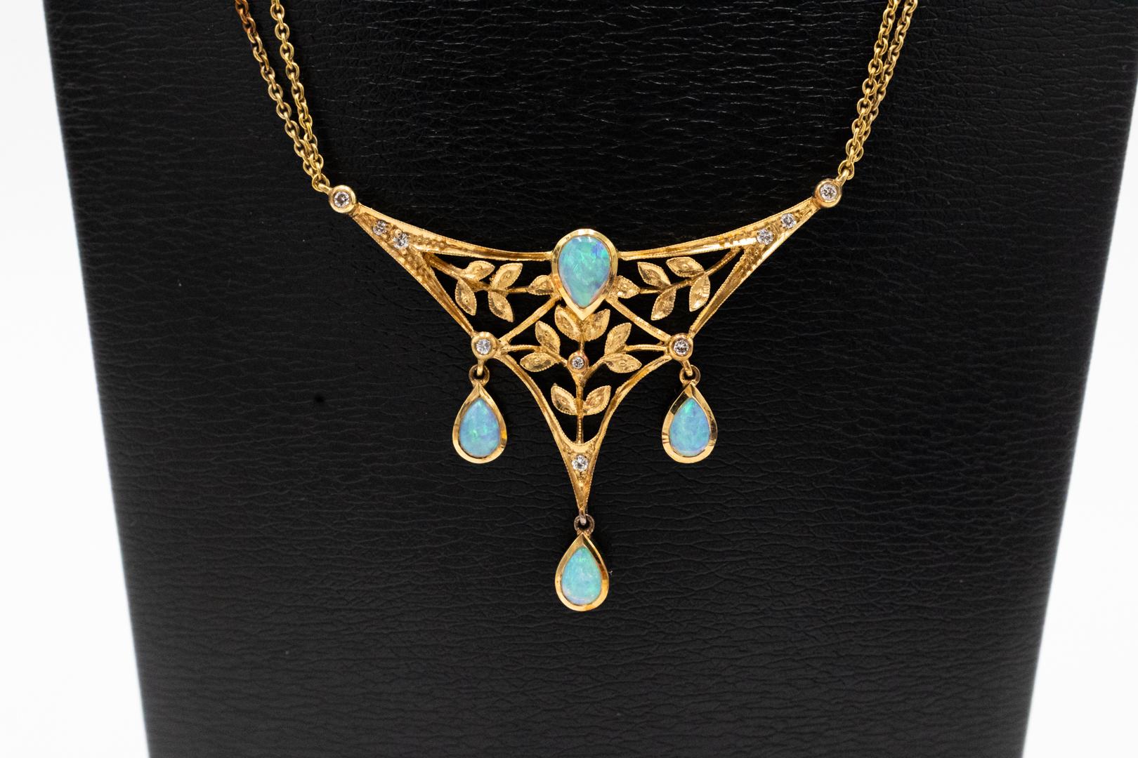 Art Nouveau necklace with diamonds and opals.

Necklace made of 14-karat yellow gold (0.585 fineness). Necklace with an openwork form with a floral motif in Art Nouveau style. Decorated with small brilliant-cut diamonds totaling approx. 0.15 ct (H-I