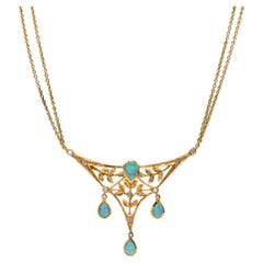 Art Nouveau style necklace with diamonds and opals.