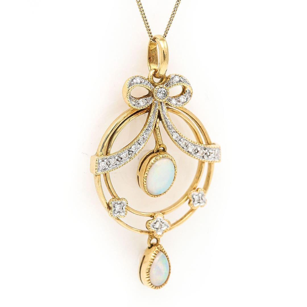 Oval Cut Art Nouveau Style Opal and Diamond Drop Pendant For Sale