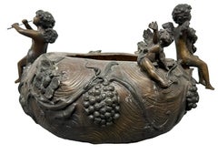 Art Nouveau Style Patinated Bronze Period Jardiniere with Cherubs Playing Flutes