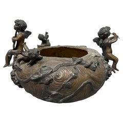 Art Nouveau Style Patinated Bronze Period Jardiniere with Cherubs Playing Flutes