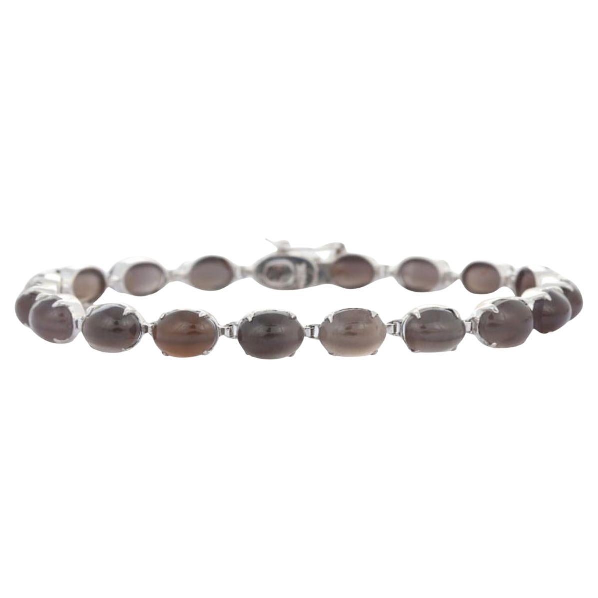 Art Nouveau Style Prong Set Cat's Eye Tennis Bracelet in 18k Solid White Gold For Sale