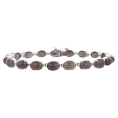 Pulsera de tenis estilo Art Nouveau con ojo de gato engastado en oro blanco macizo de 18 quilates