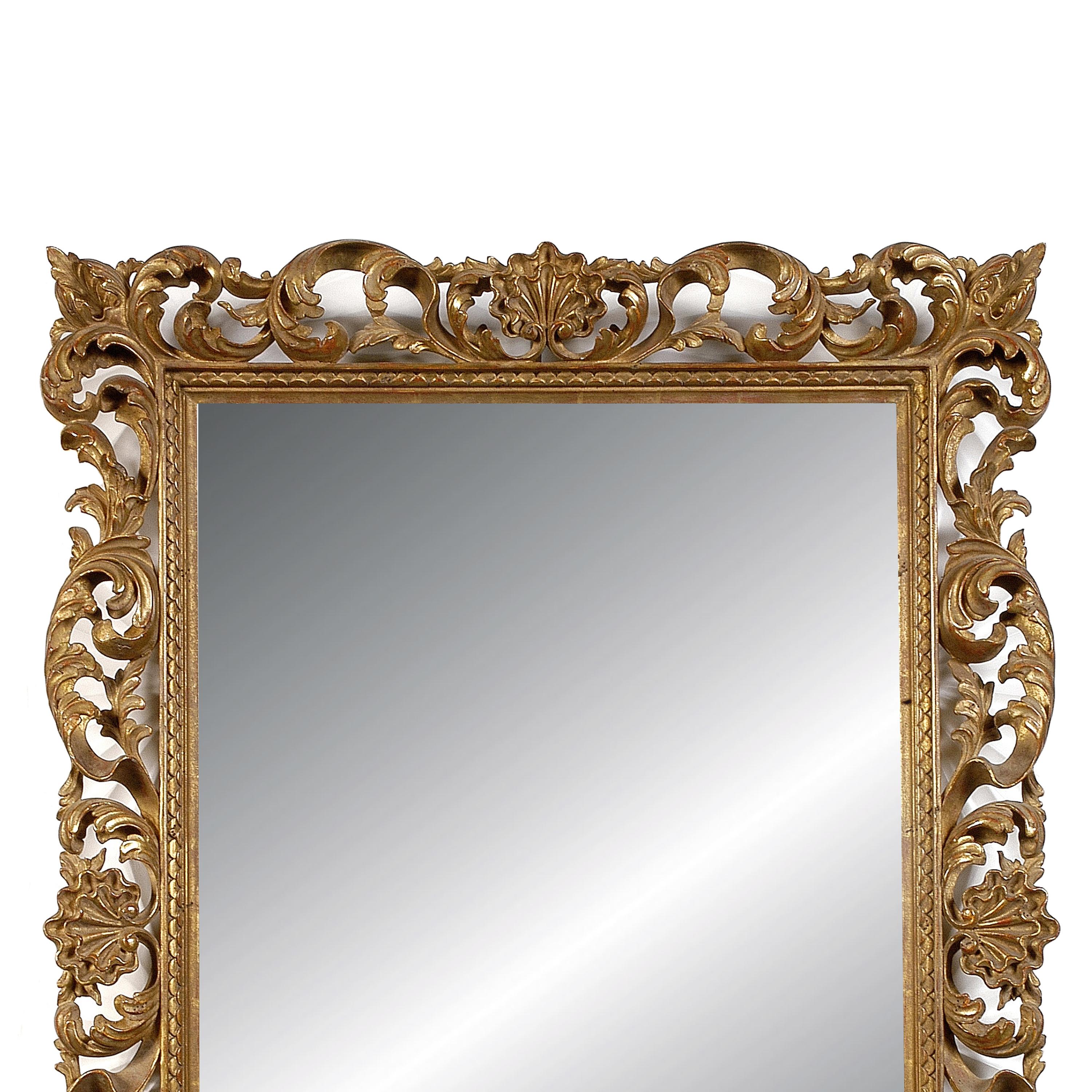 Art Nouveau style handcrafted mirror. Rectangular hand carved wooden structure with gold foil finished. Spain, 1970.