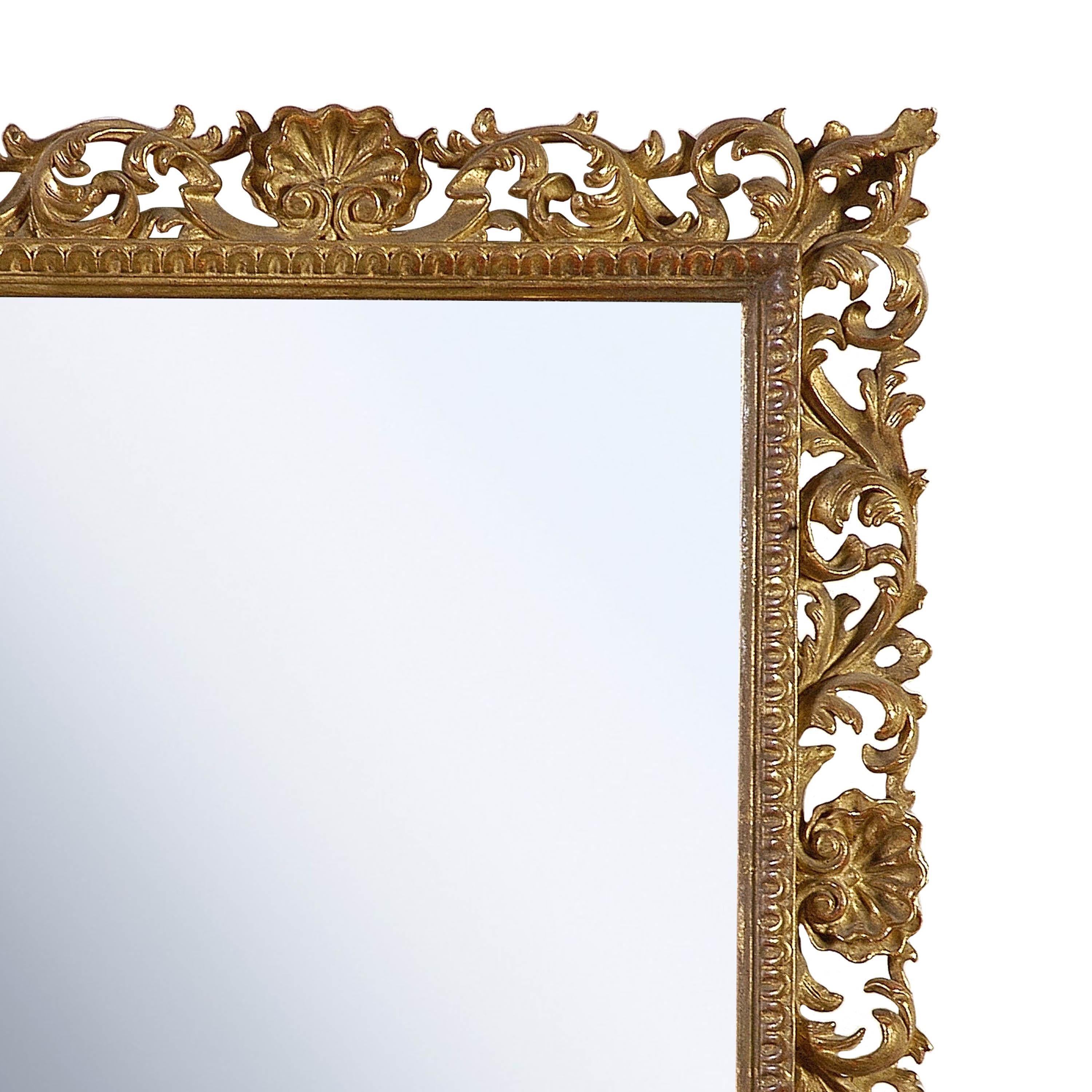 Art Nouveau style handcrafted mirror. Rectangular hand carved wooden structure with gold foil finished. Spain, 1970.