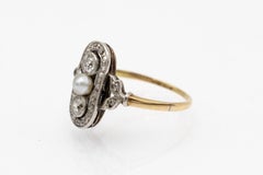 Art Nouveau style ring with pearl and diamonds