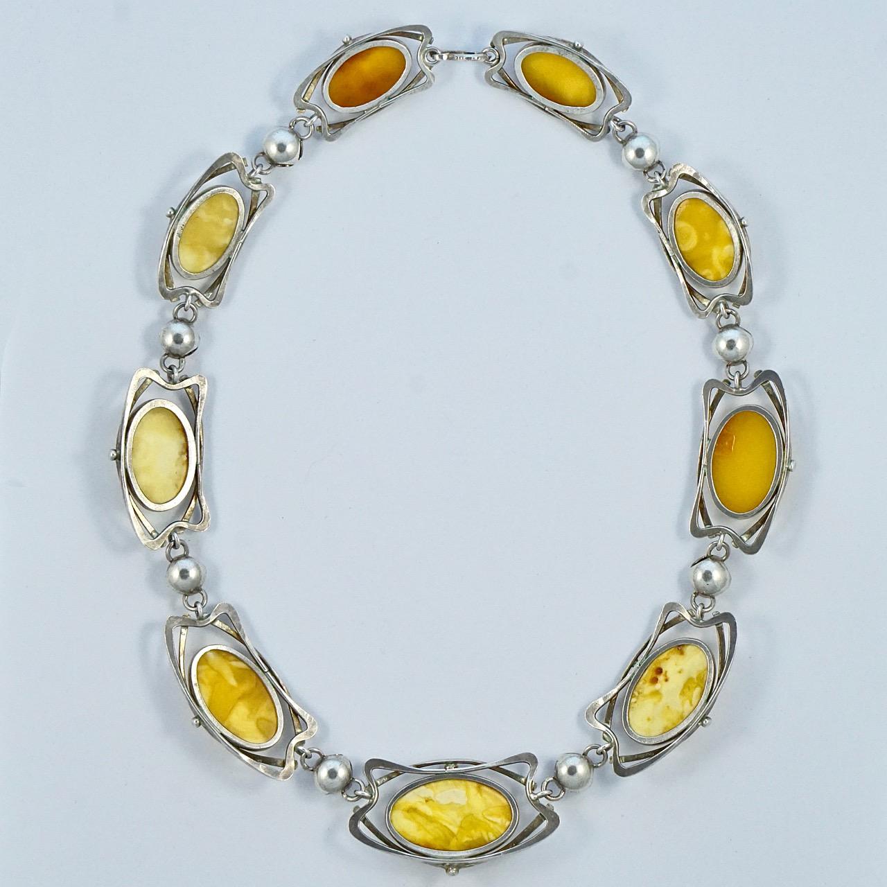 Oval Cut Art Nouveau Style Sterling Silver and Polished Butterscotch Amber Link Necklace For Sale