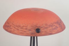 Art Nouveau-style table lamp in cast iron and art glass. France, mid-20th C.