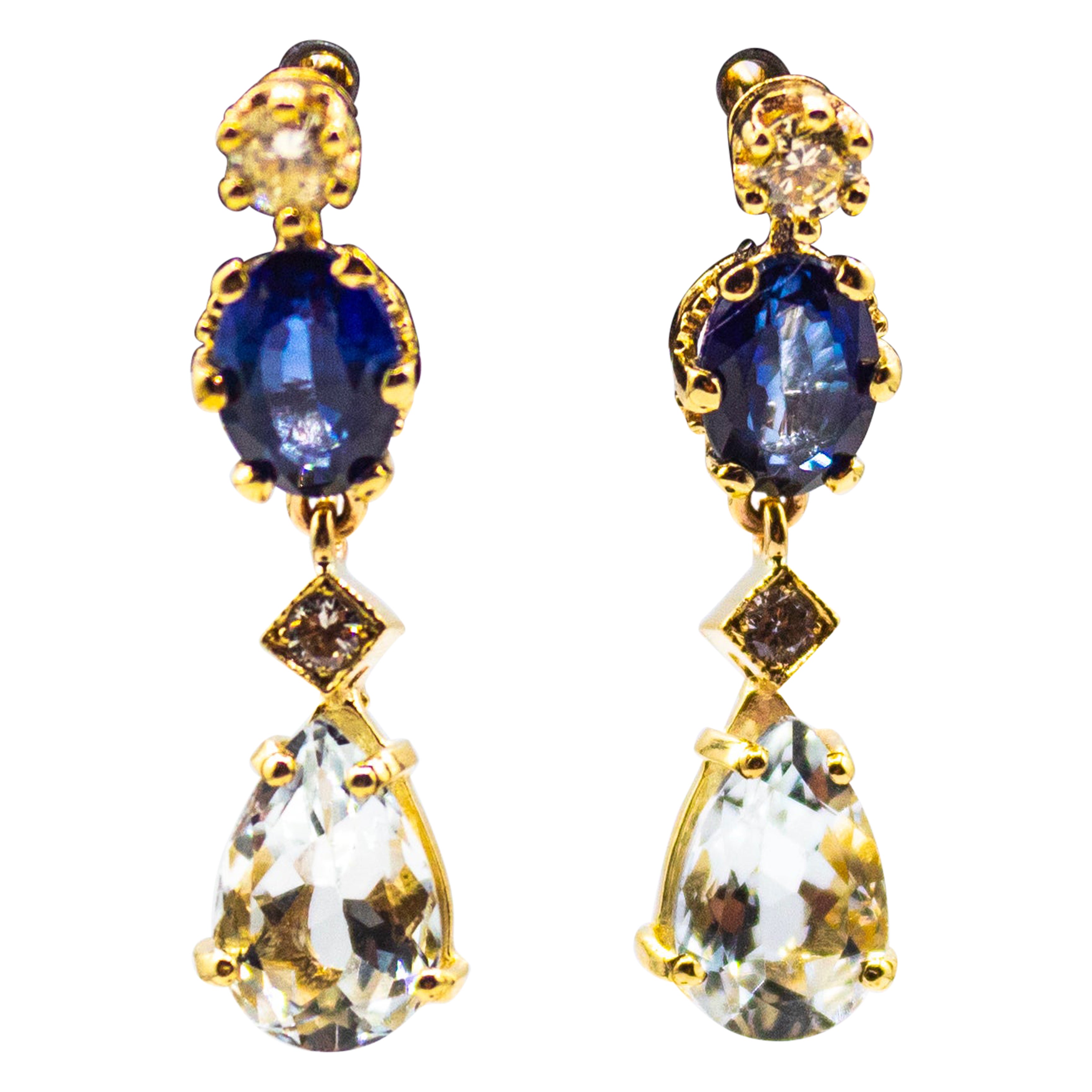 Boucles d
oreilles Art Nouveau en or jaune, diamant blanc, saphir bleu et aigue-marine