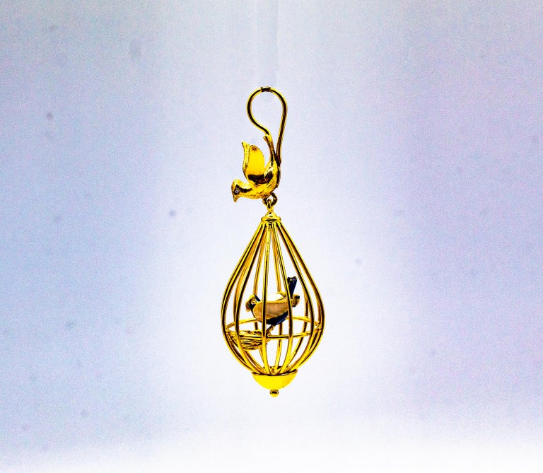 This Pendant is made of 9K Yellow Gold.
This Pendant has 0.02 Carats of White Brilliant Cut Diamonds.
This Pendant has Pearls.
This Pendant has Enamel.

This Pendant is available also in 9, 14 or 18K Yellow or White Gold.
This Pendant is available